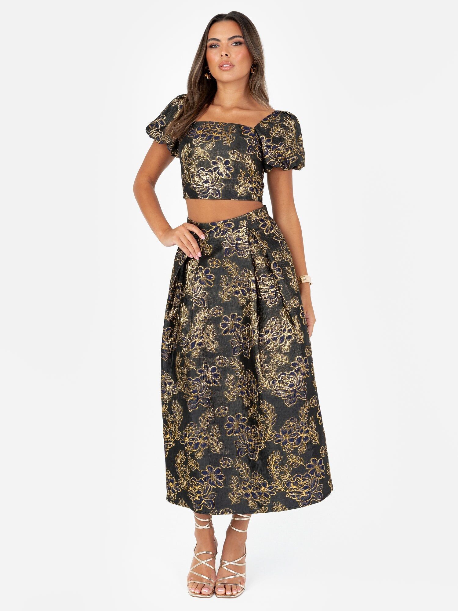 Falda midi plisada con bolsillos y estampado floral en jacquard dorado Maya