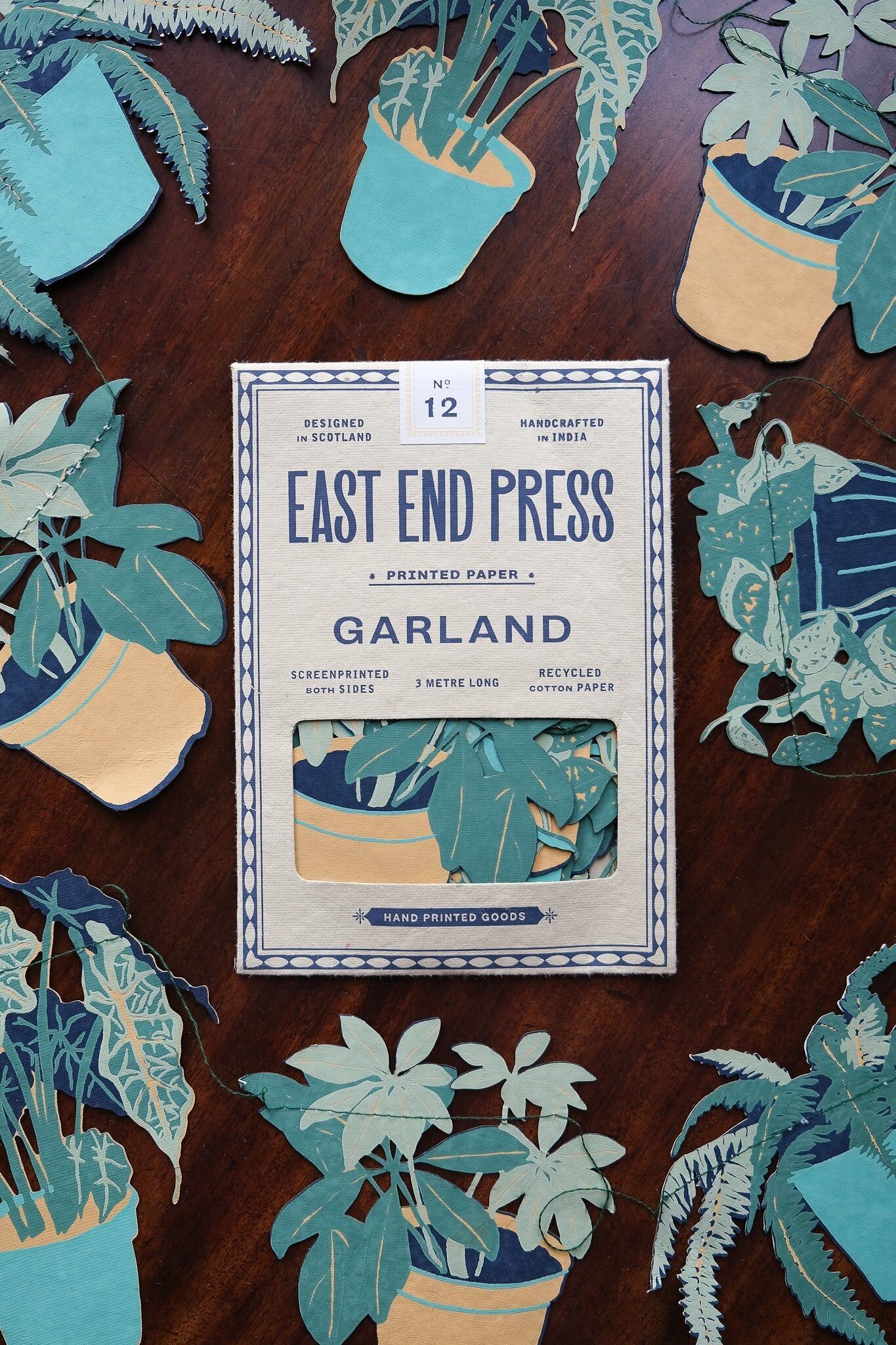 Genähte Girlande mit Zimmerpflanzen