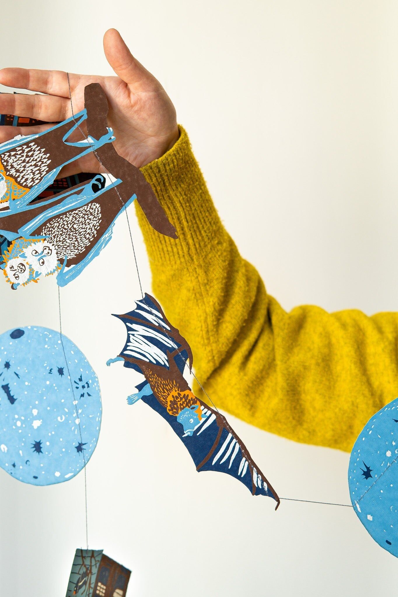 Ghirlanda cucita a forma di casa stregata