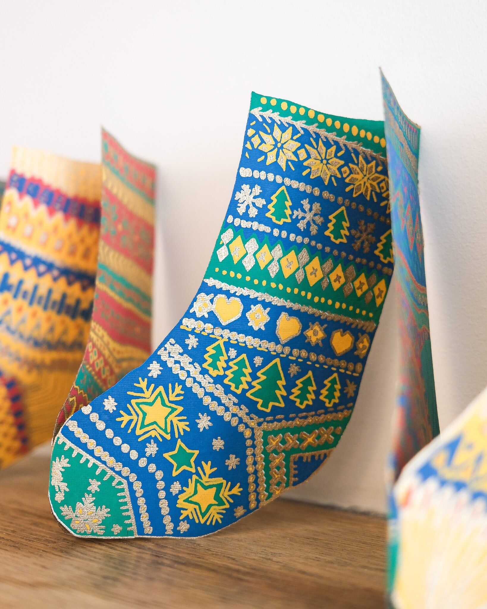 Strümpfe Ziehharmonika-Girlande