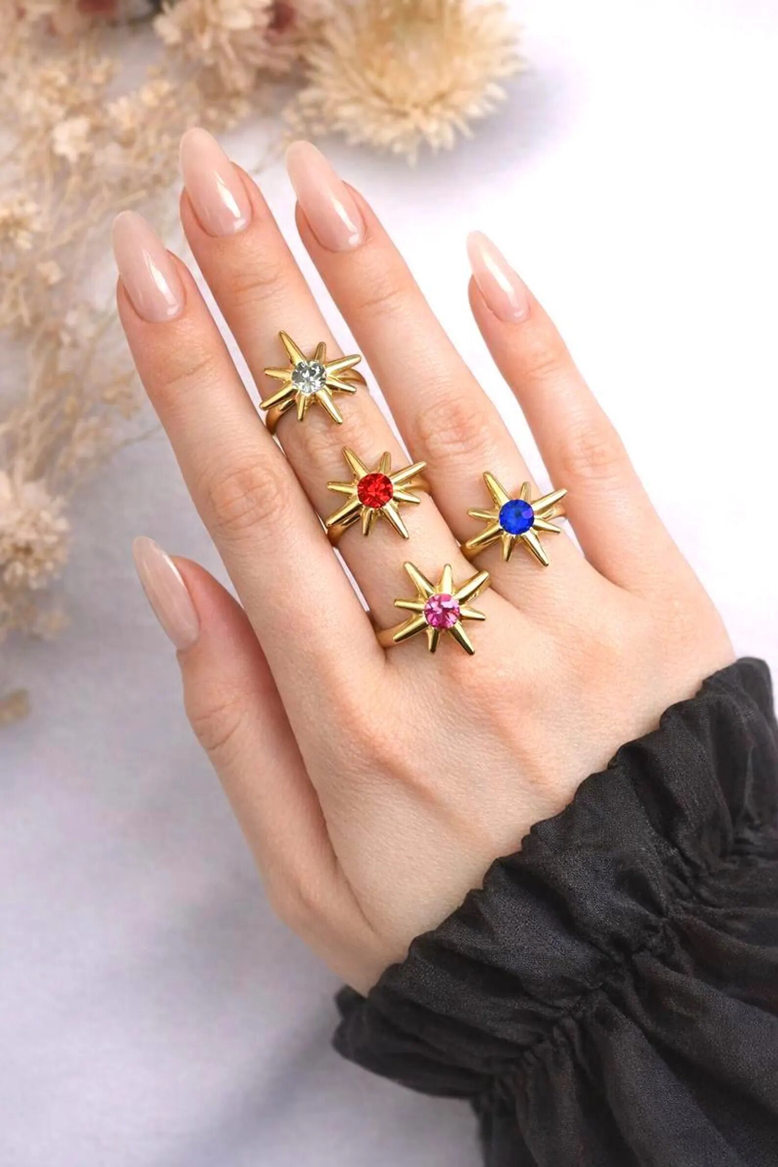 Anello regolabile in acciaio con motivo a stella polare