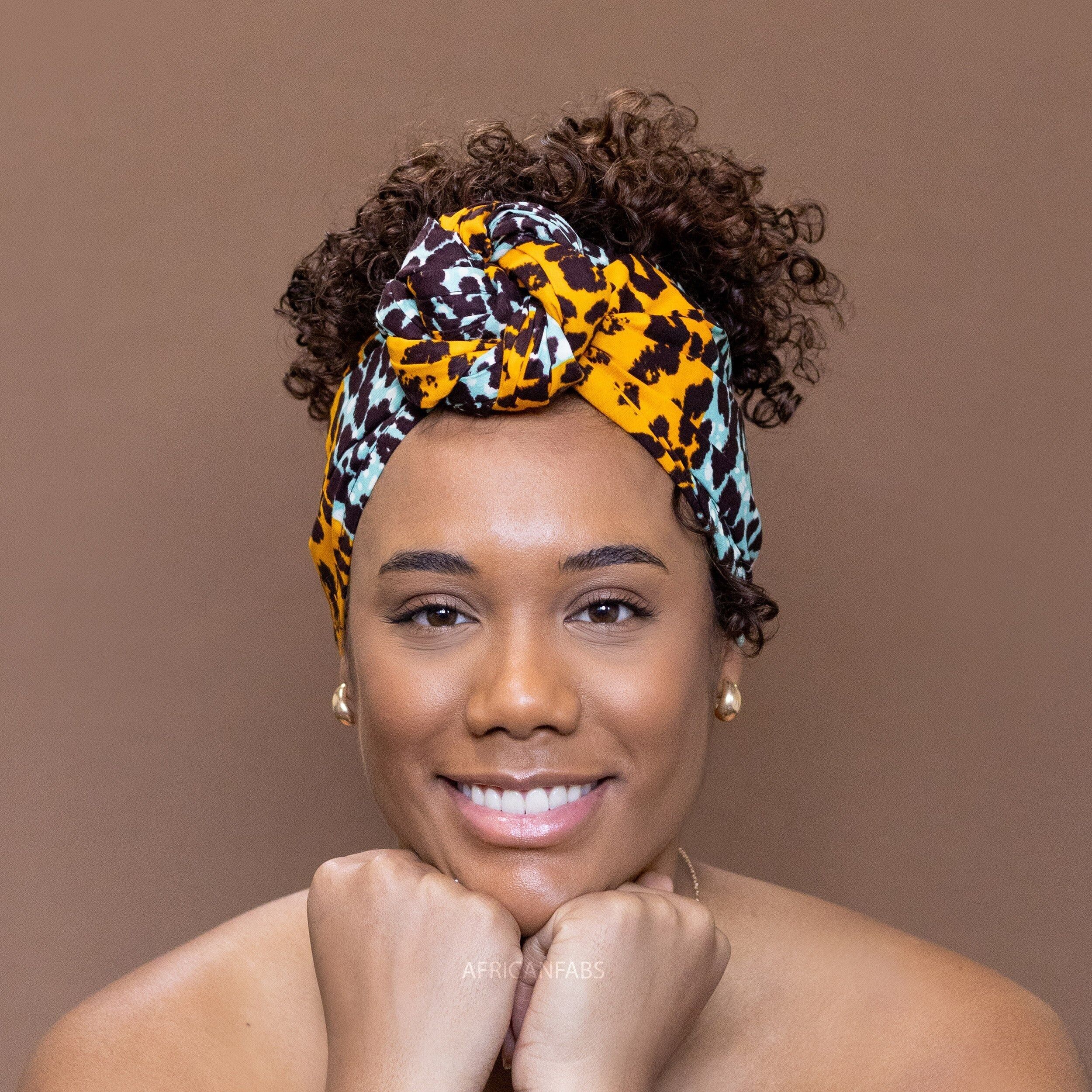 Copricapo arancione/turchese African Panther