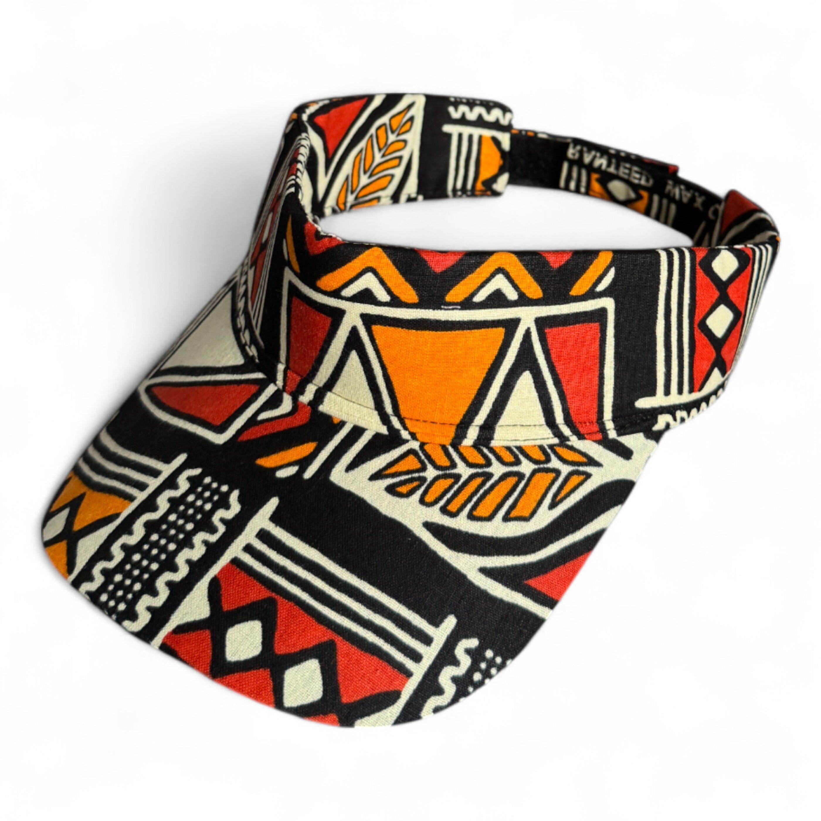 Cappellino con visiera parasole con stampa africana - Simboli Bogolan rossi e arancioni