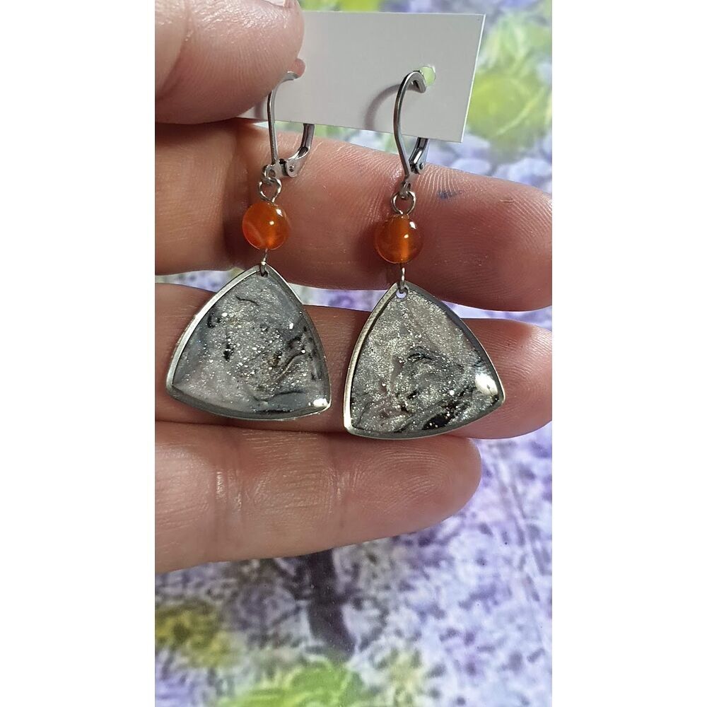#1246 – Metamorphosis triangle earrings with celestial swirl and carnelian pearl