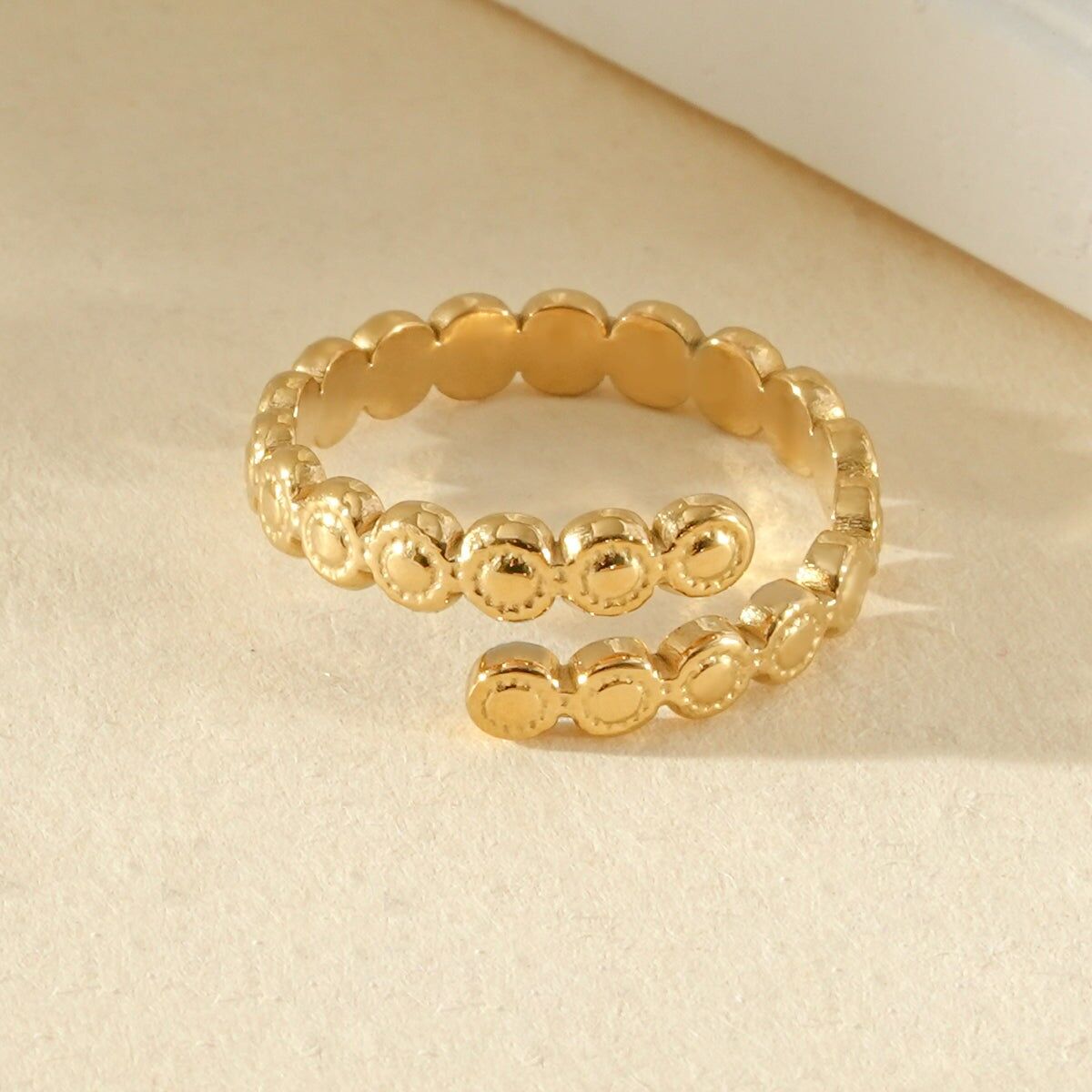 Adjustable gold-plated toe ring with mini textured rounds