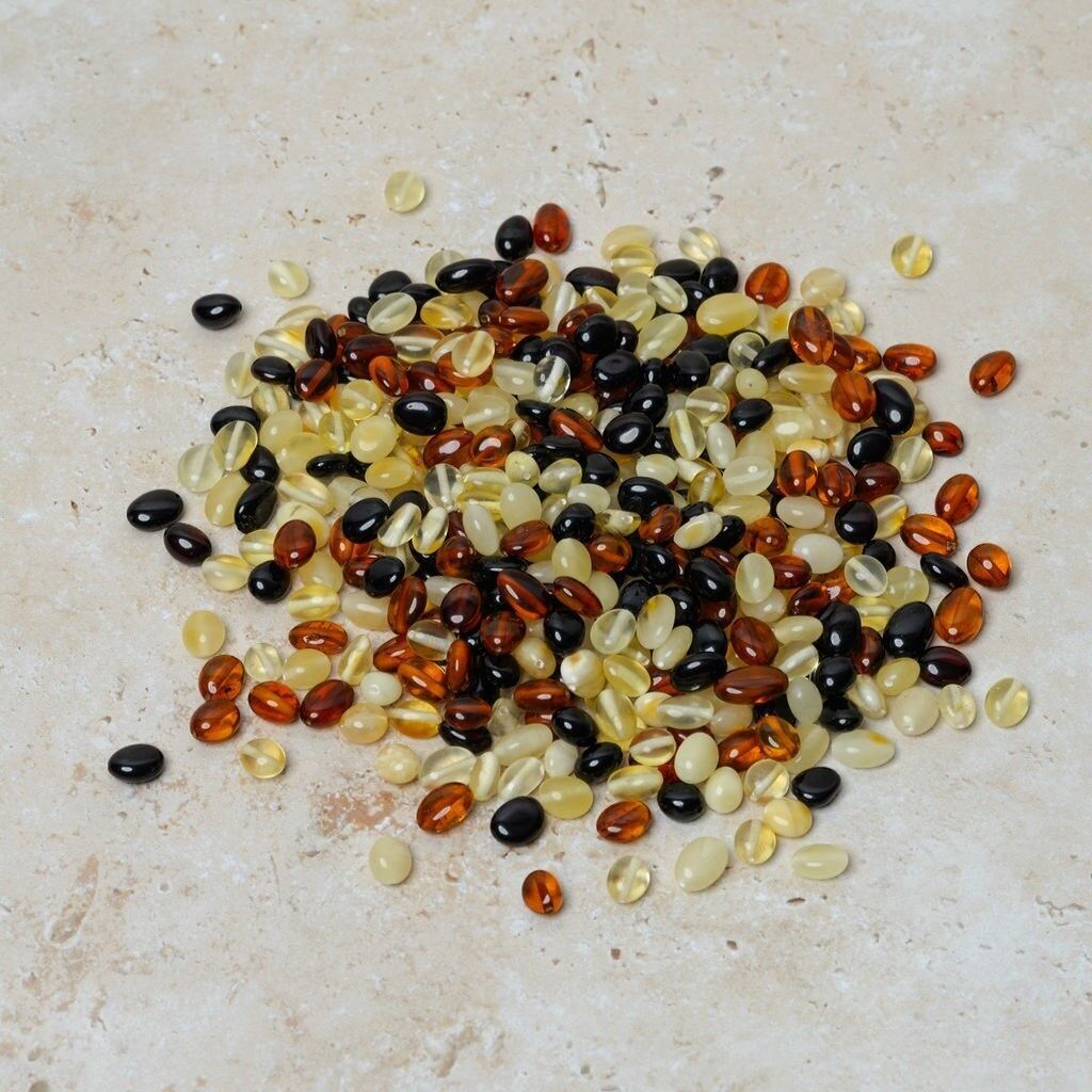 Perle di ambra forate ovali multicolore 50 gr (~400 pz)