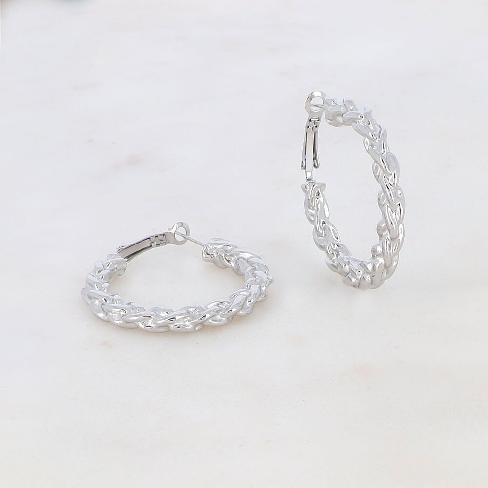 Orecchini a cerchio con cricchetto, effetto intrecciato