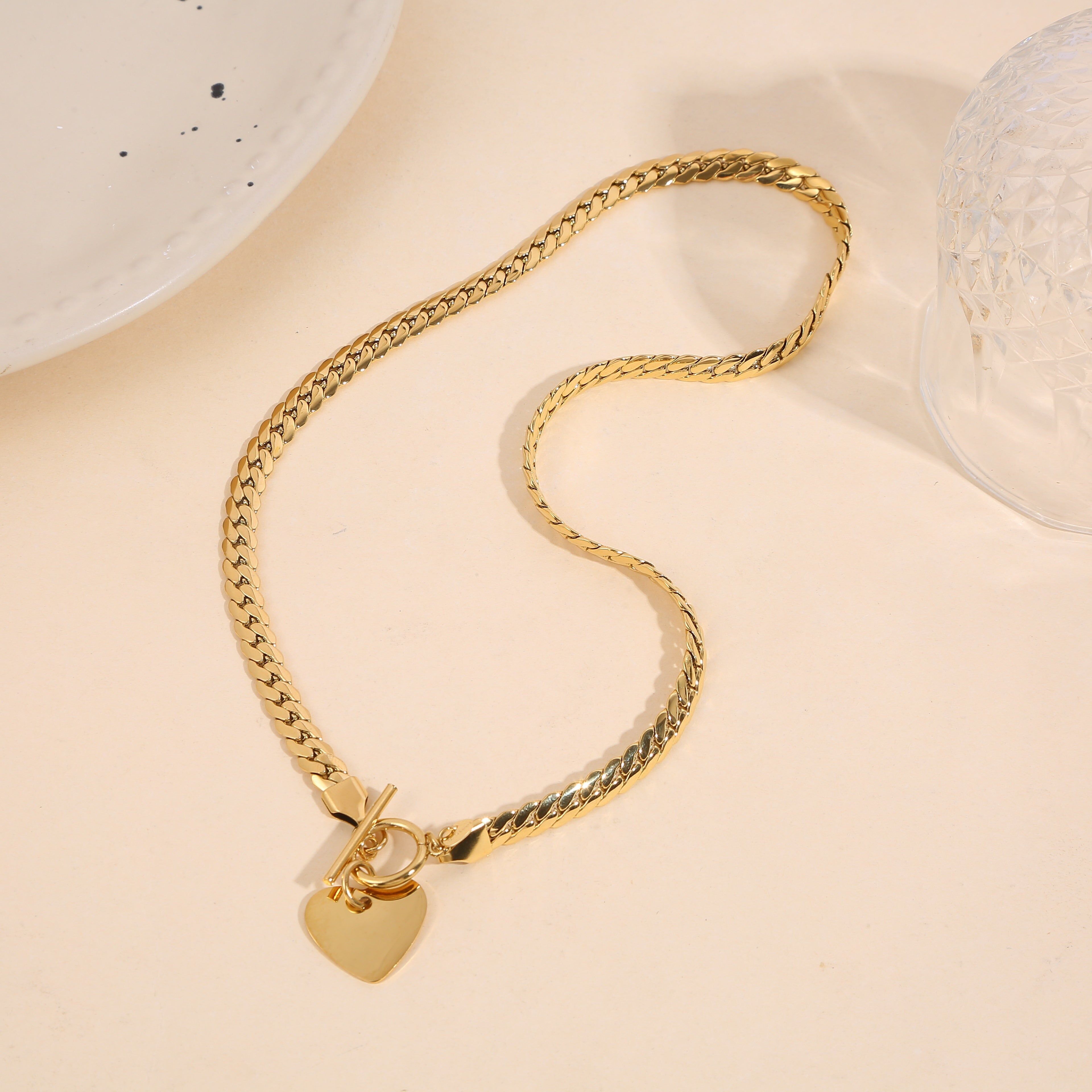 Flat curb chain necklace with smooth heart toggle clasp