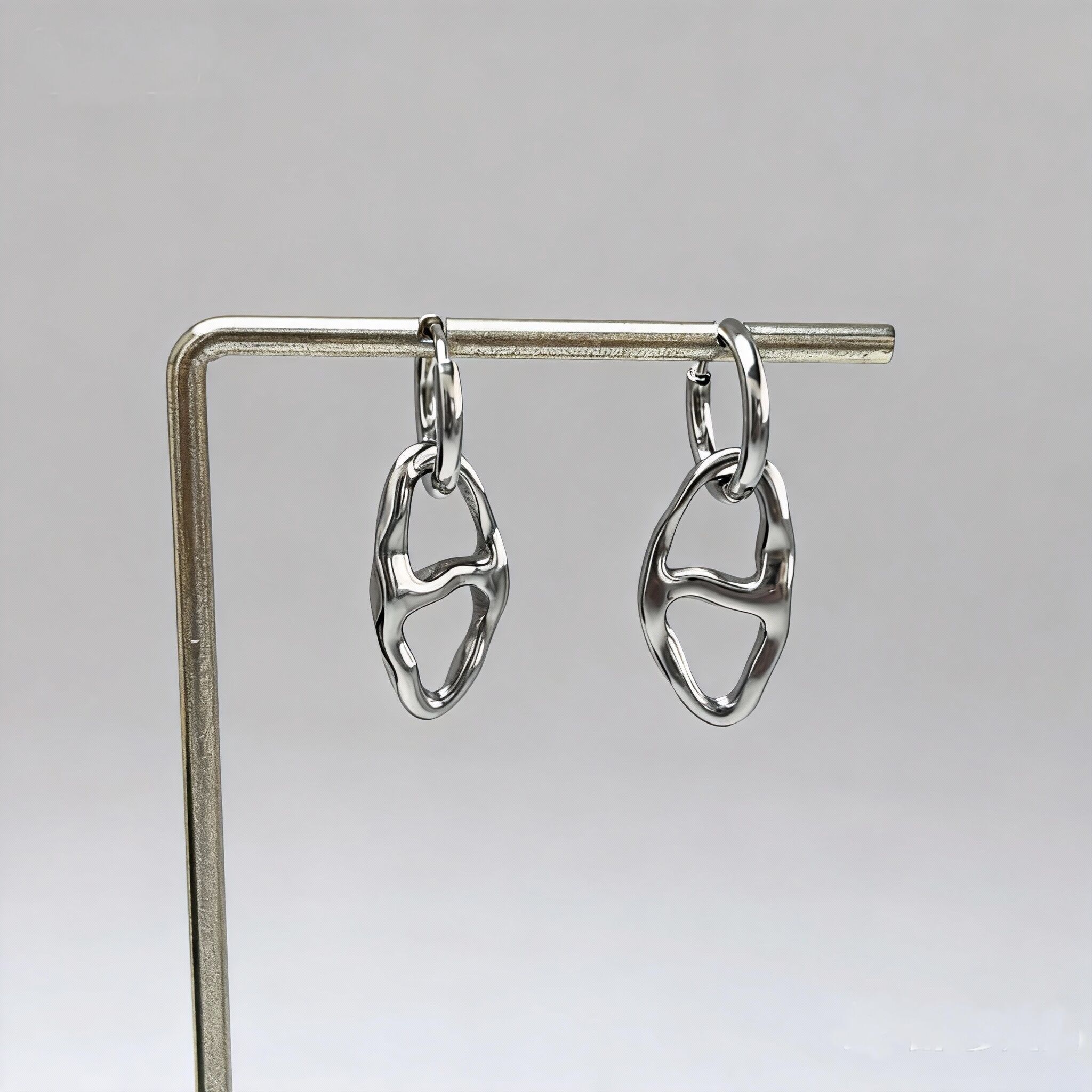 Silver hoop earrings with separate hammered oval pendant