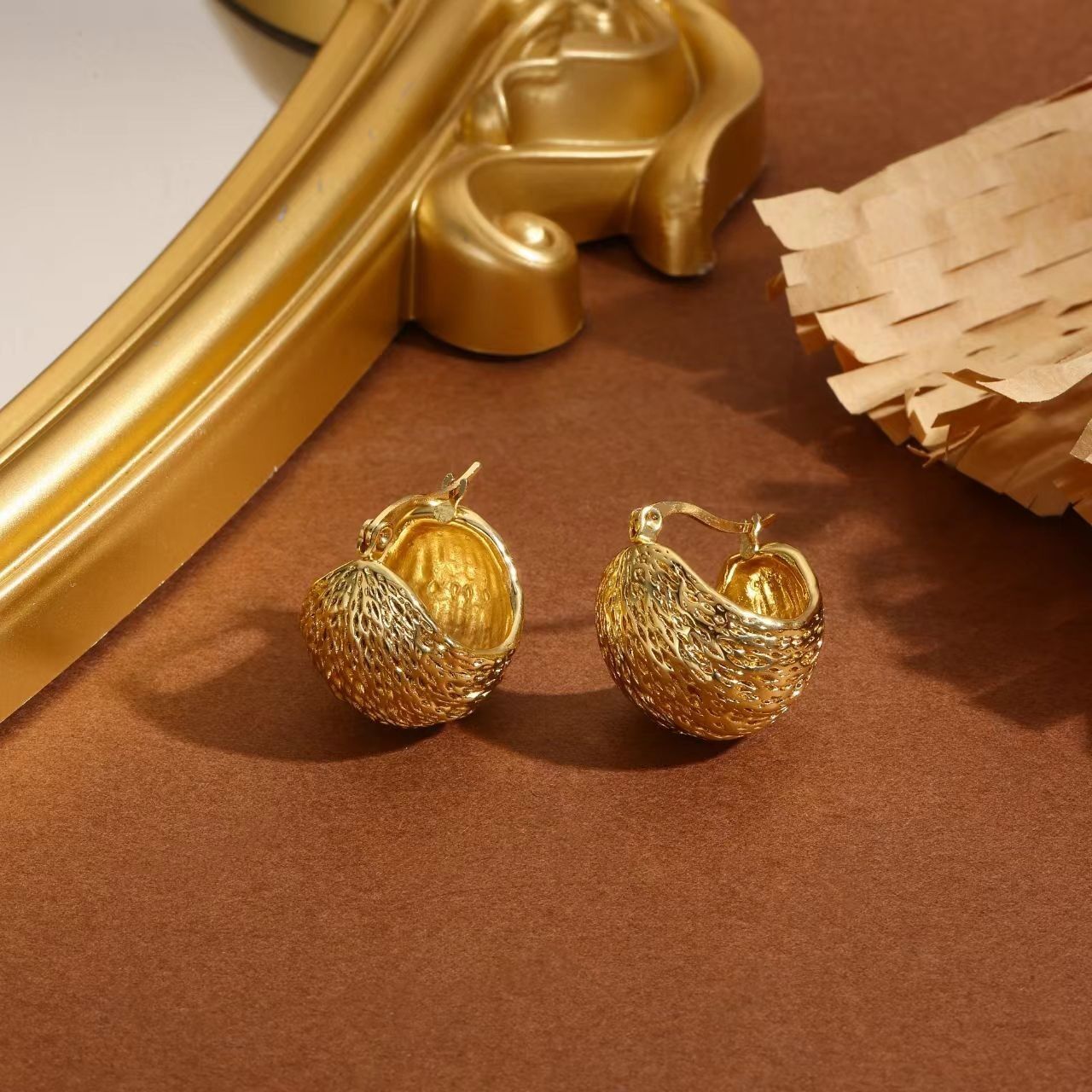 Thick, domed, textured hoop earrings