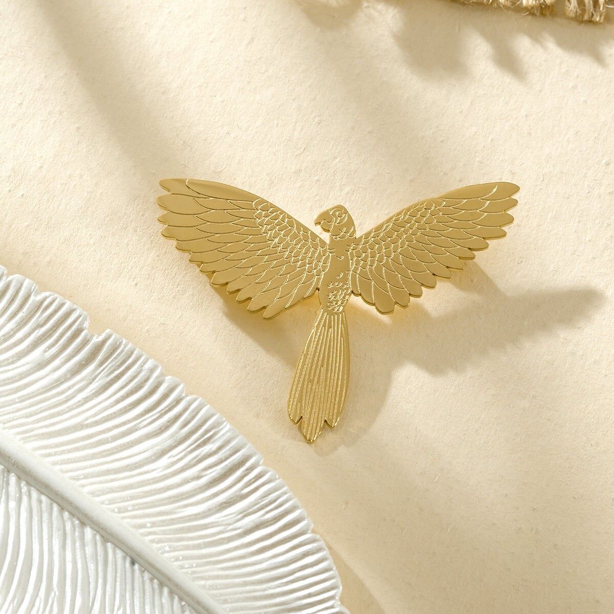 Gold Phoenix brooch with mythological bird motif