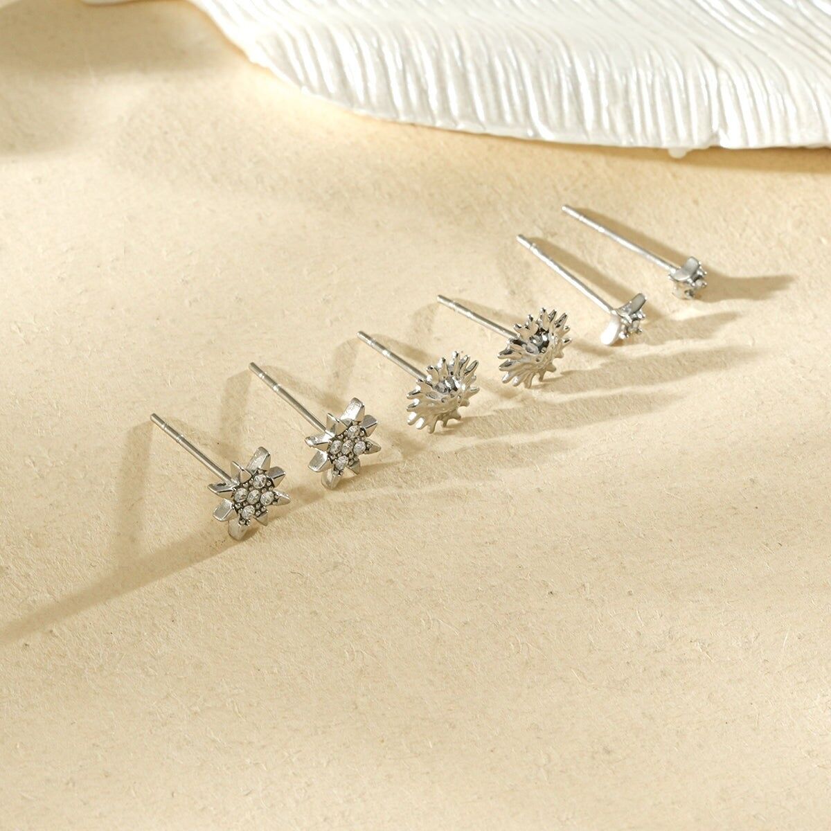 Set mit 3 Paar Stern- und Sonnenohrsteckern