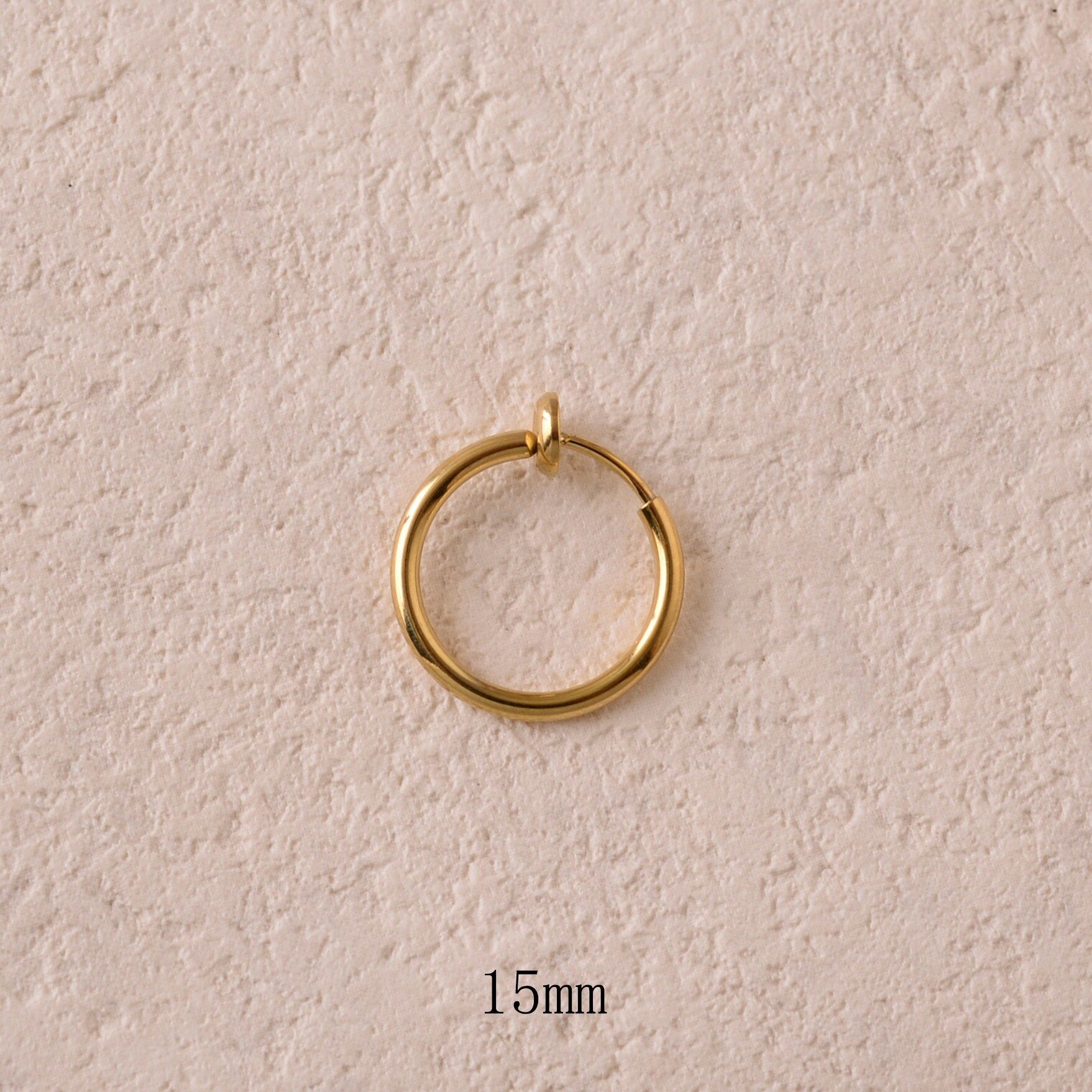 Mini orecchini a cerchio con clip 15 mm x 1,6