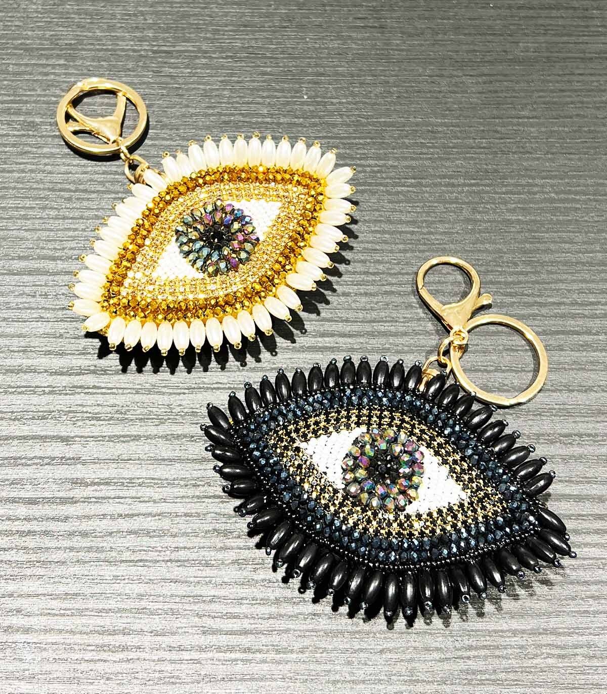 Porte-Clé Oeil Protecteur Velours Tissé - 9x7cm