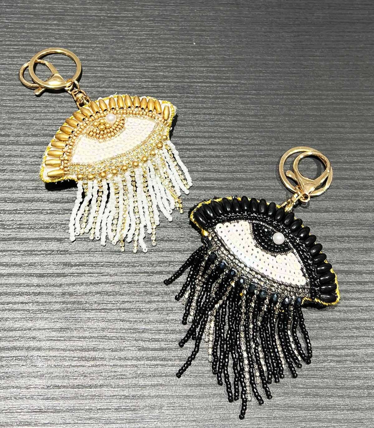 Porte-Clé Oeil Protecteur Velours Tissé - 8x4cm