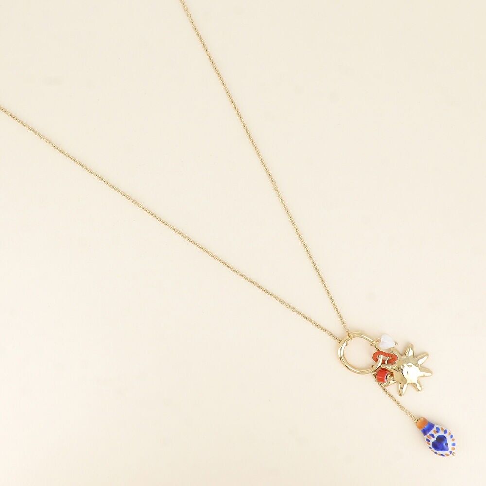 Long necklace - sunburst, glazed ceramic bead, mother-of-pearl heart bead and beads