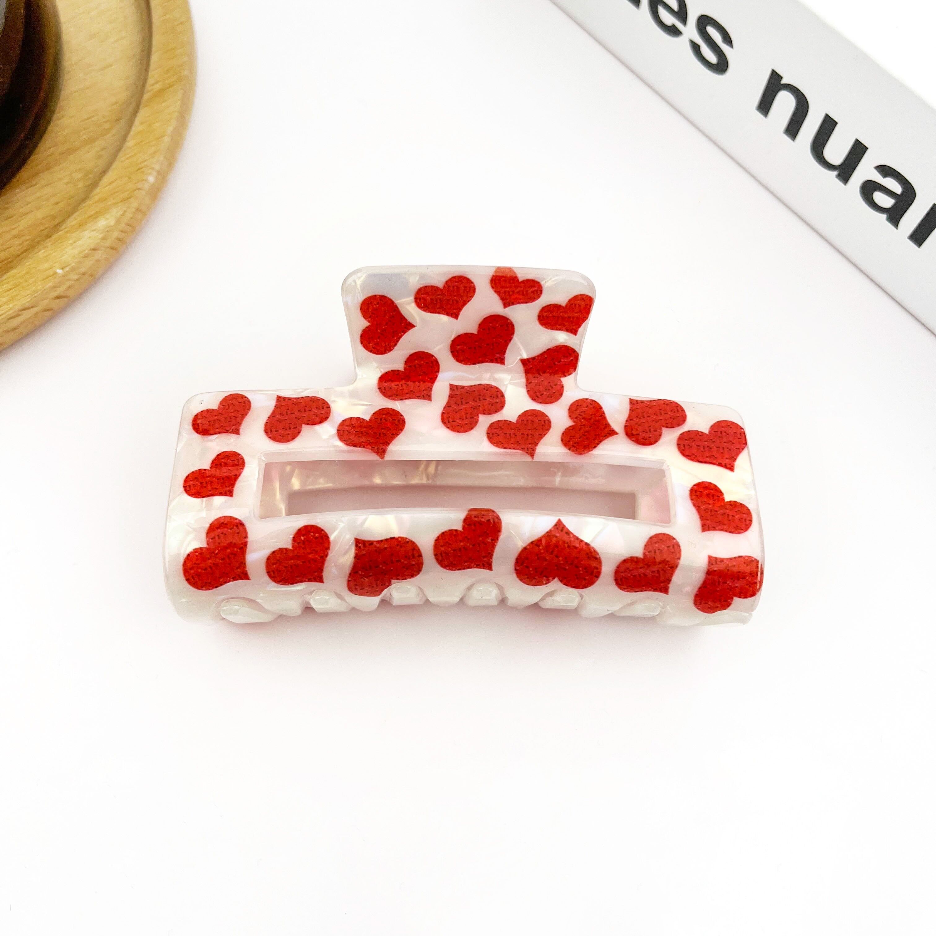 Haarspange mit rotem Herzmotiv aus PVC-Druck