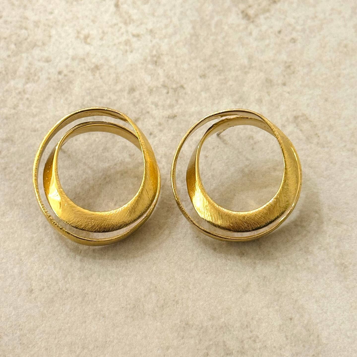Hypnotic Brushed Gold Stud Earrings