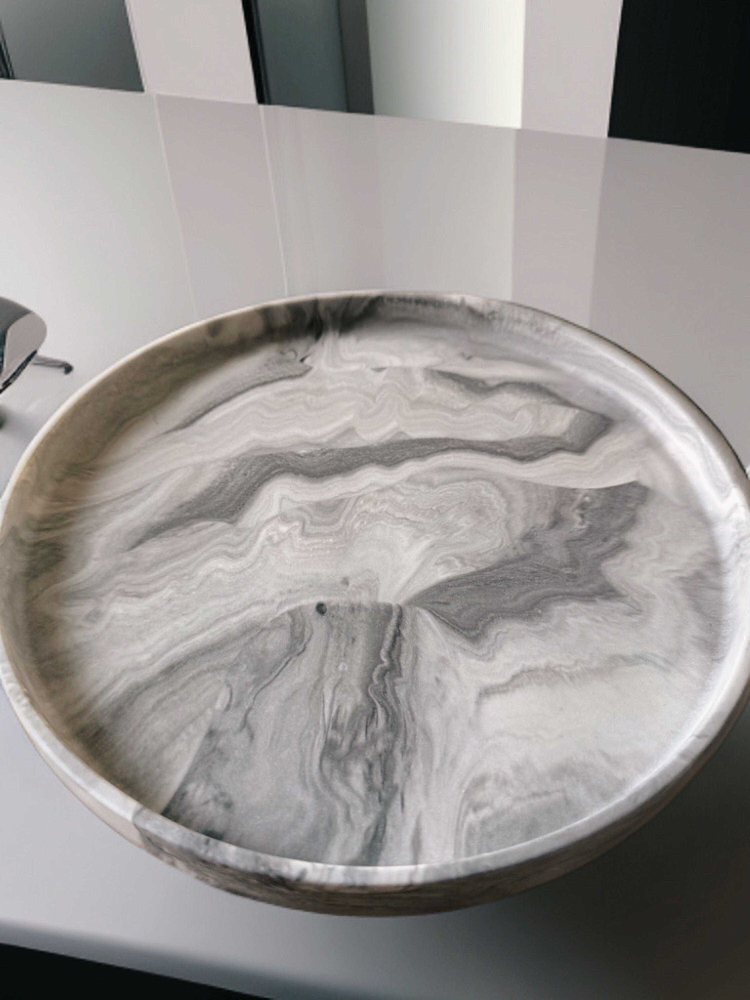 large round handmade jesmonite tray in marble or plain color