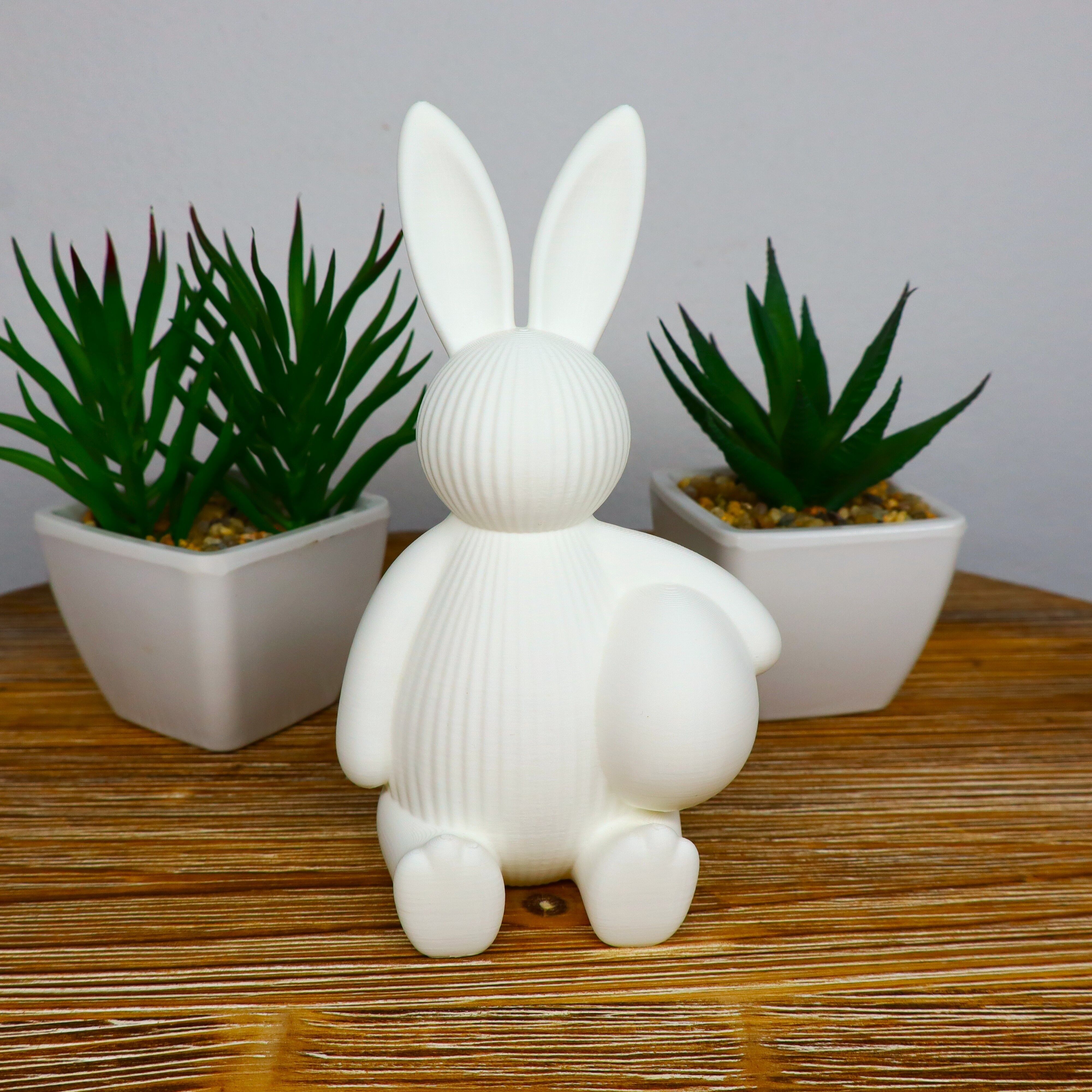 Figurine de lapin de Pâques tenant un œuf, jolie décoration printanière