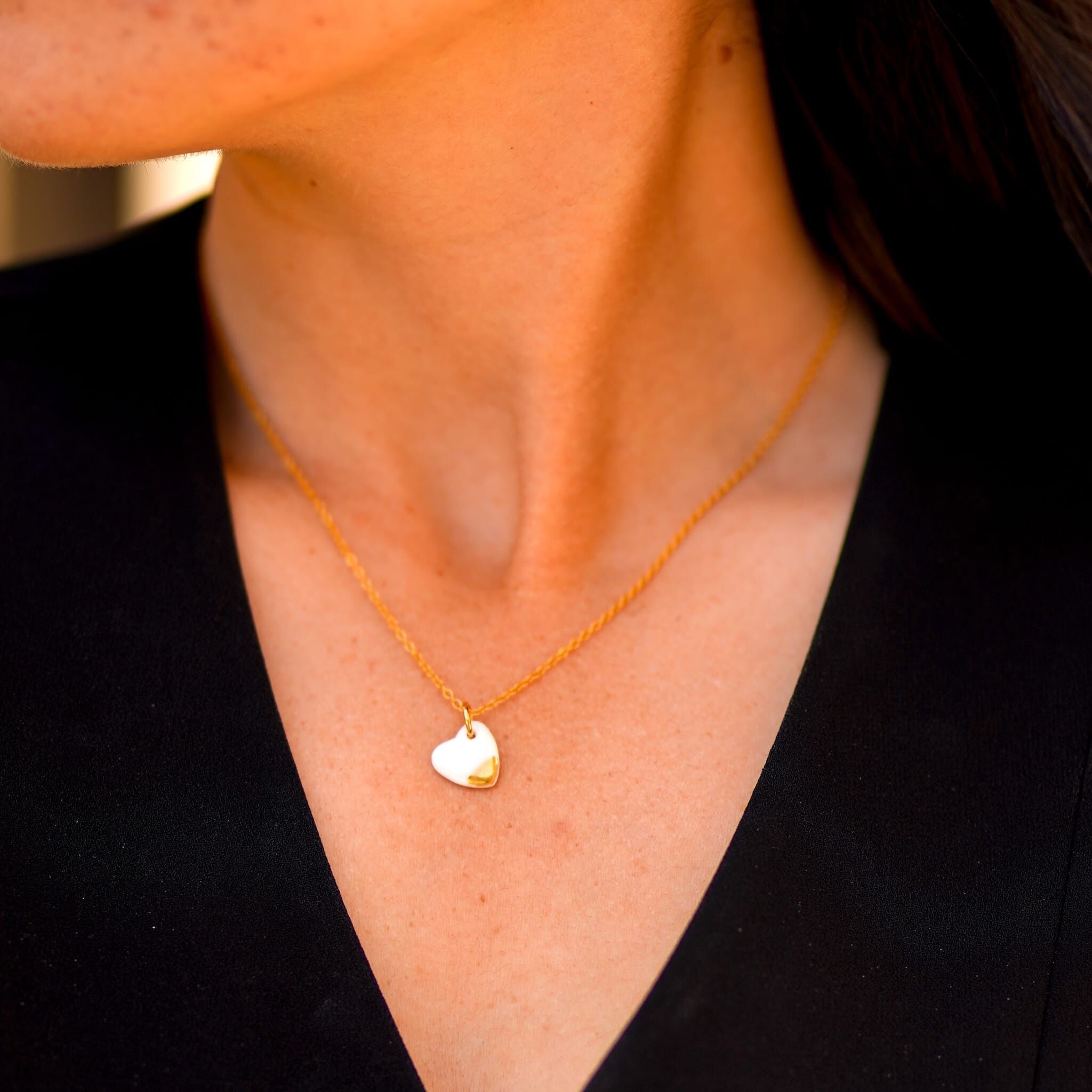 Small porcelain and gold heart necklace