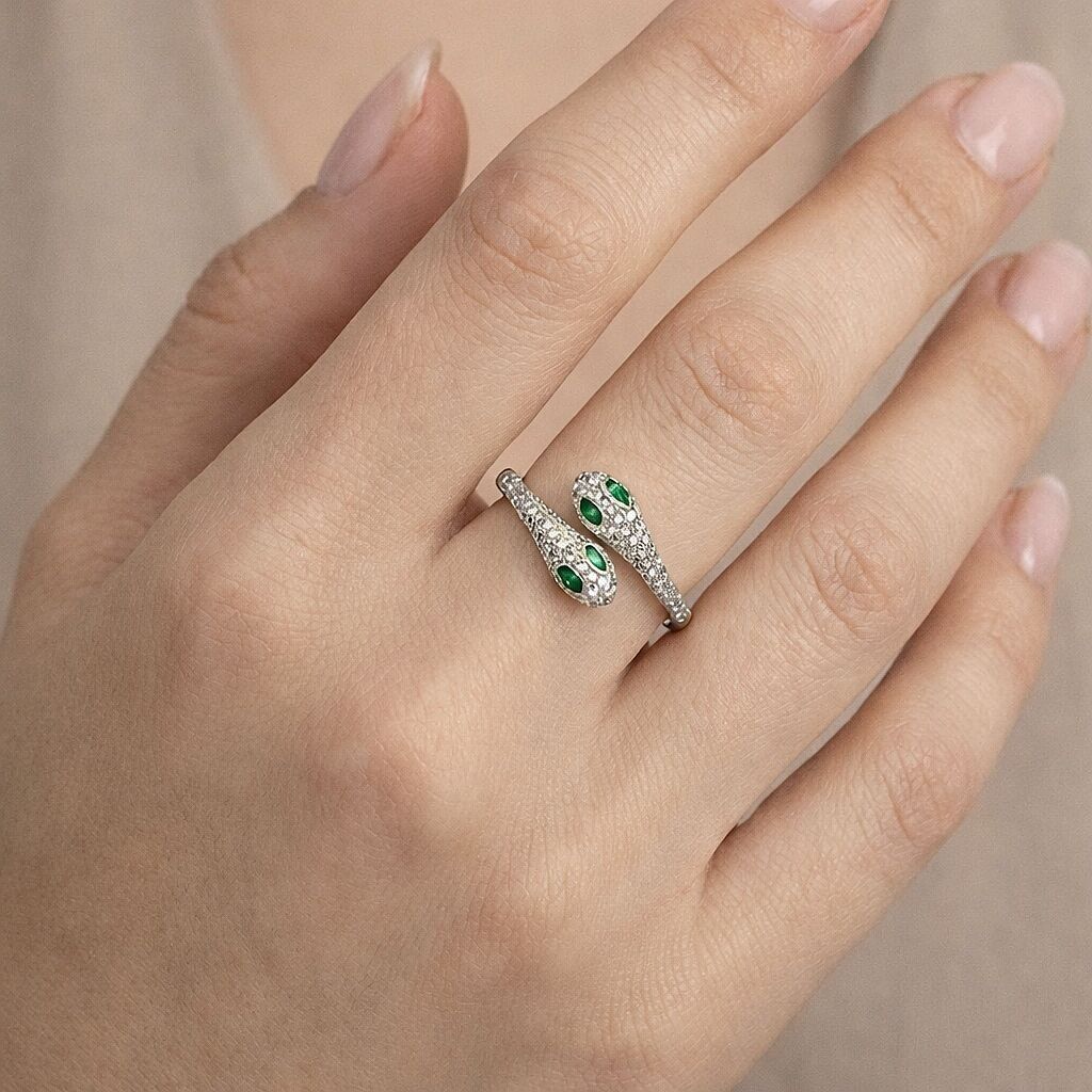 Bague serpent pavée de strass et pierres vertes
