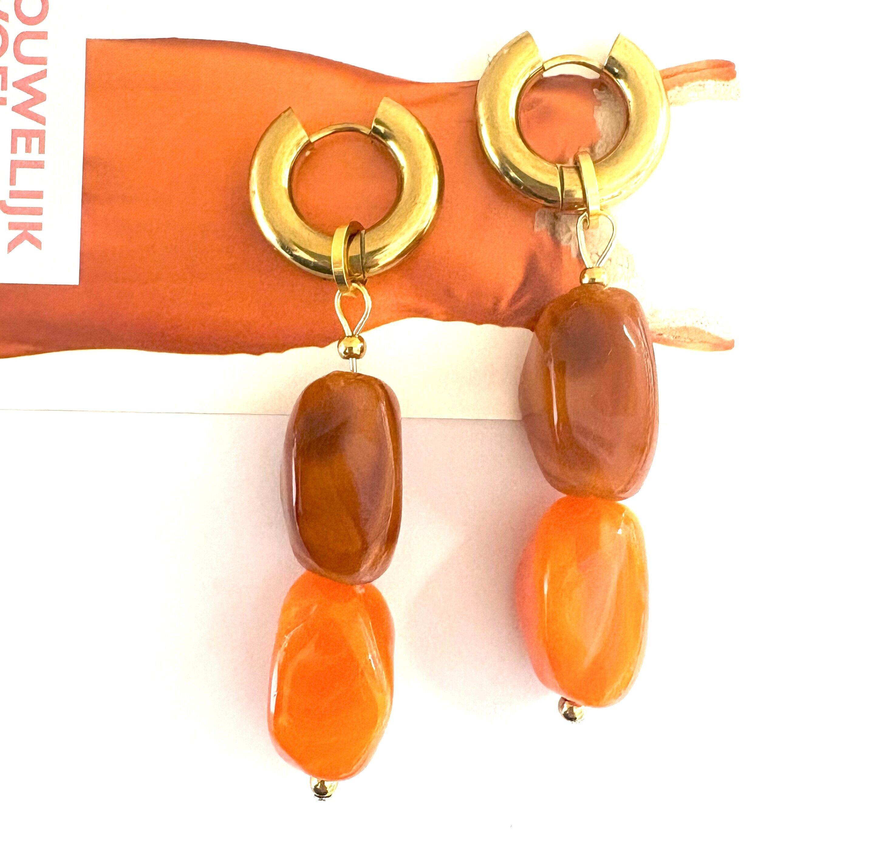 Earrings with orange and cognac acrylic beads