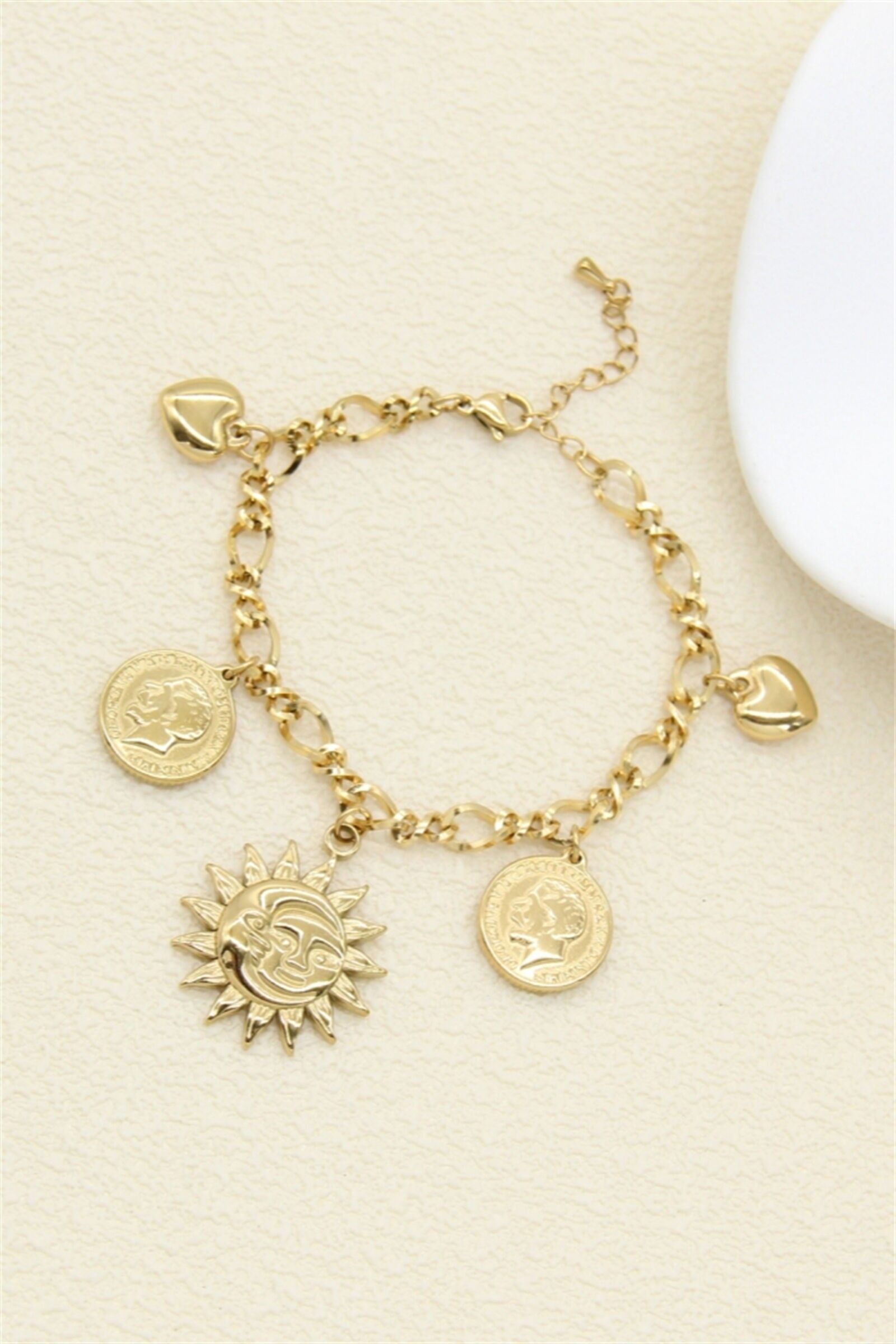 Gold charm bracelet – Sun & vintage medals