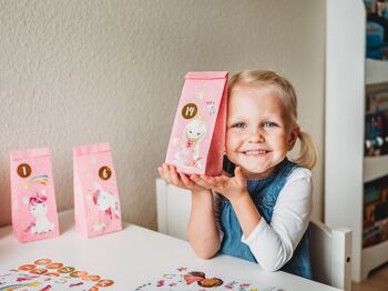 Calendrier de l'Avent Premium à remplir - princesse et licorne à coller - avec 24 sacs en papier imprimés roses et de superbes autocollants pour enfants - Noël 2