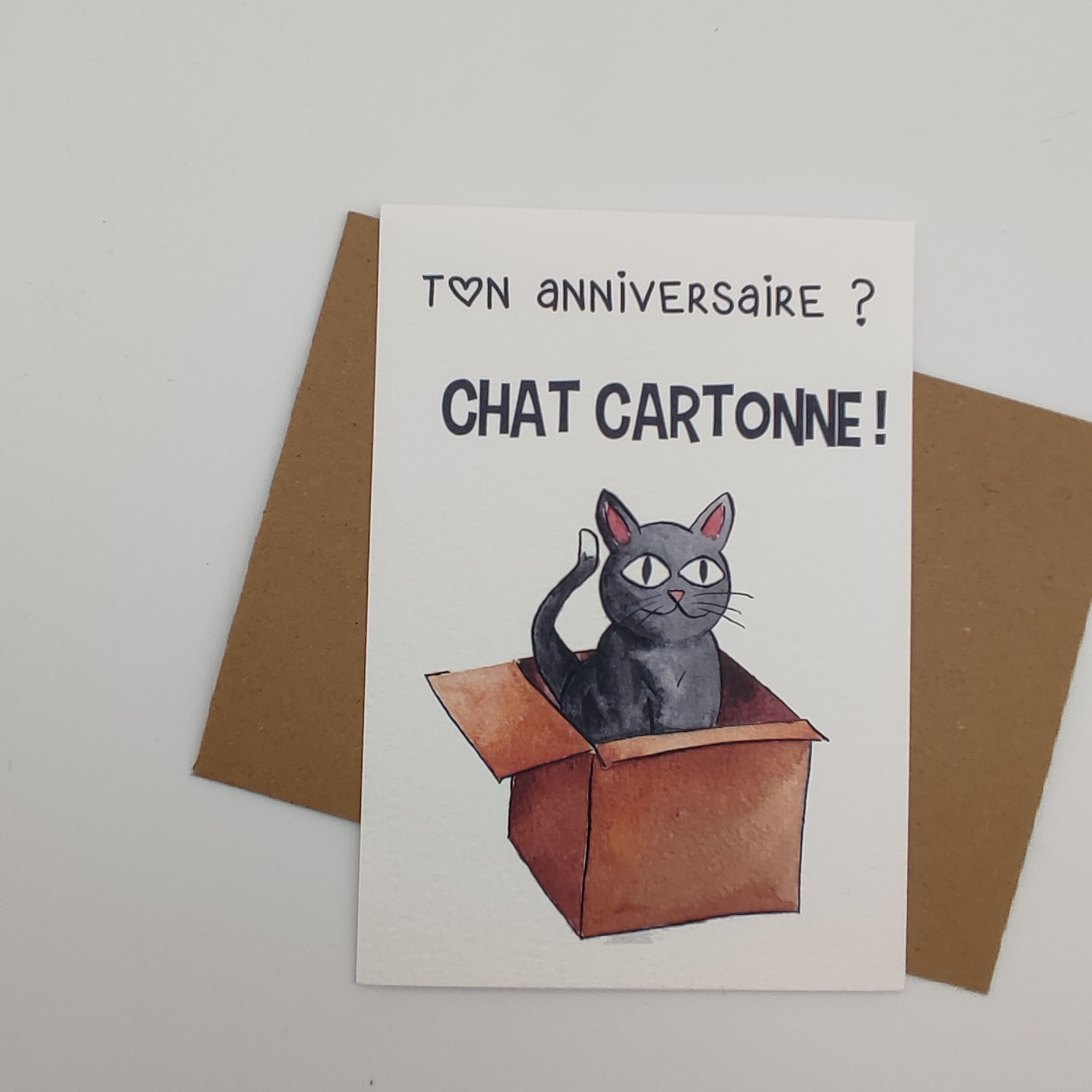 Carte aquarelle illustrée anniversaire – "Chat cartonne". A6