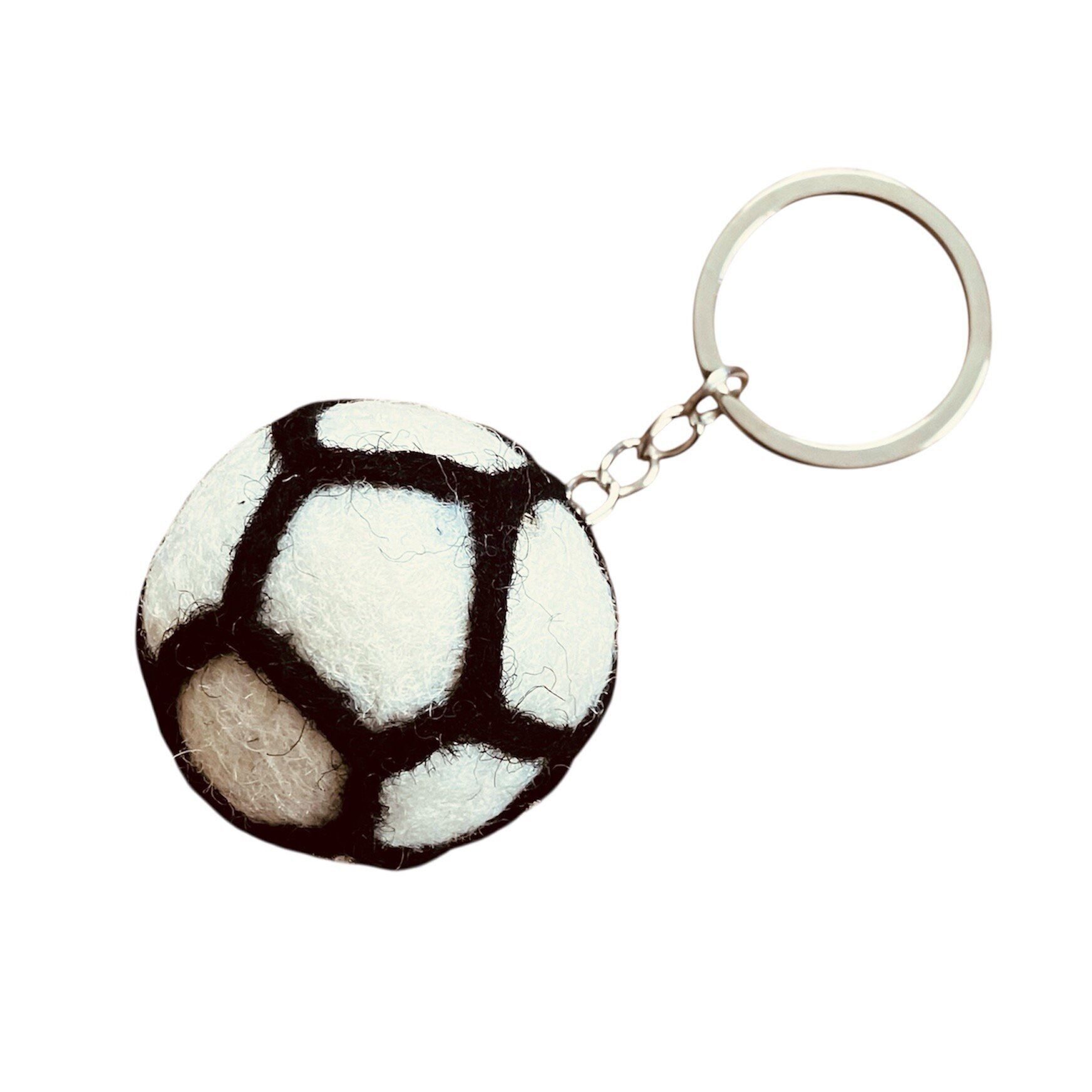 sustainable keychain football - bag charm - black and white - wool felt - handmade in Nepal