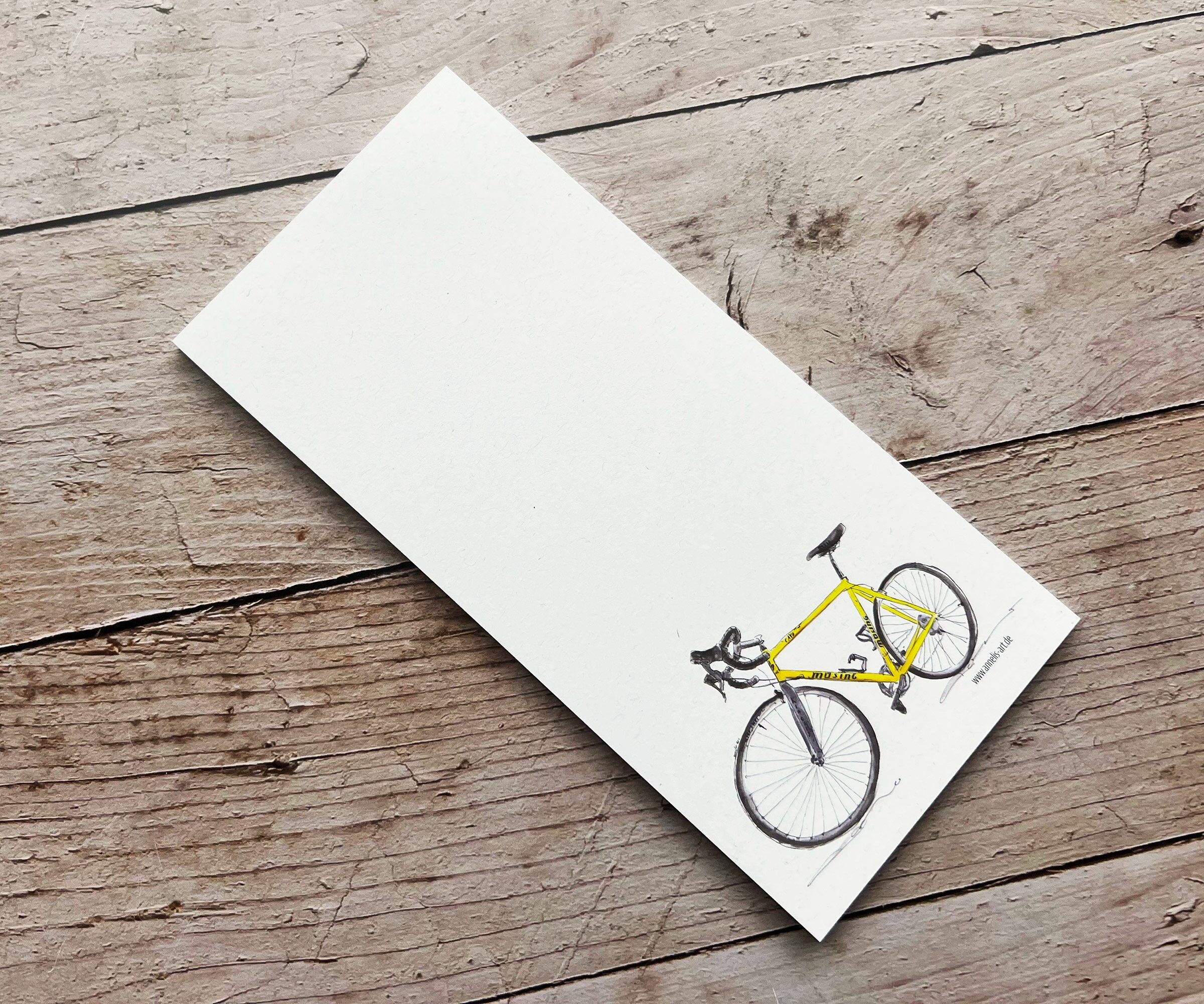 Notepad | Yellow racing bike Müsing | 99 x 210 mm | White recycled paper
