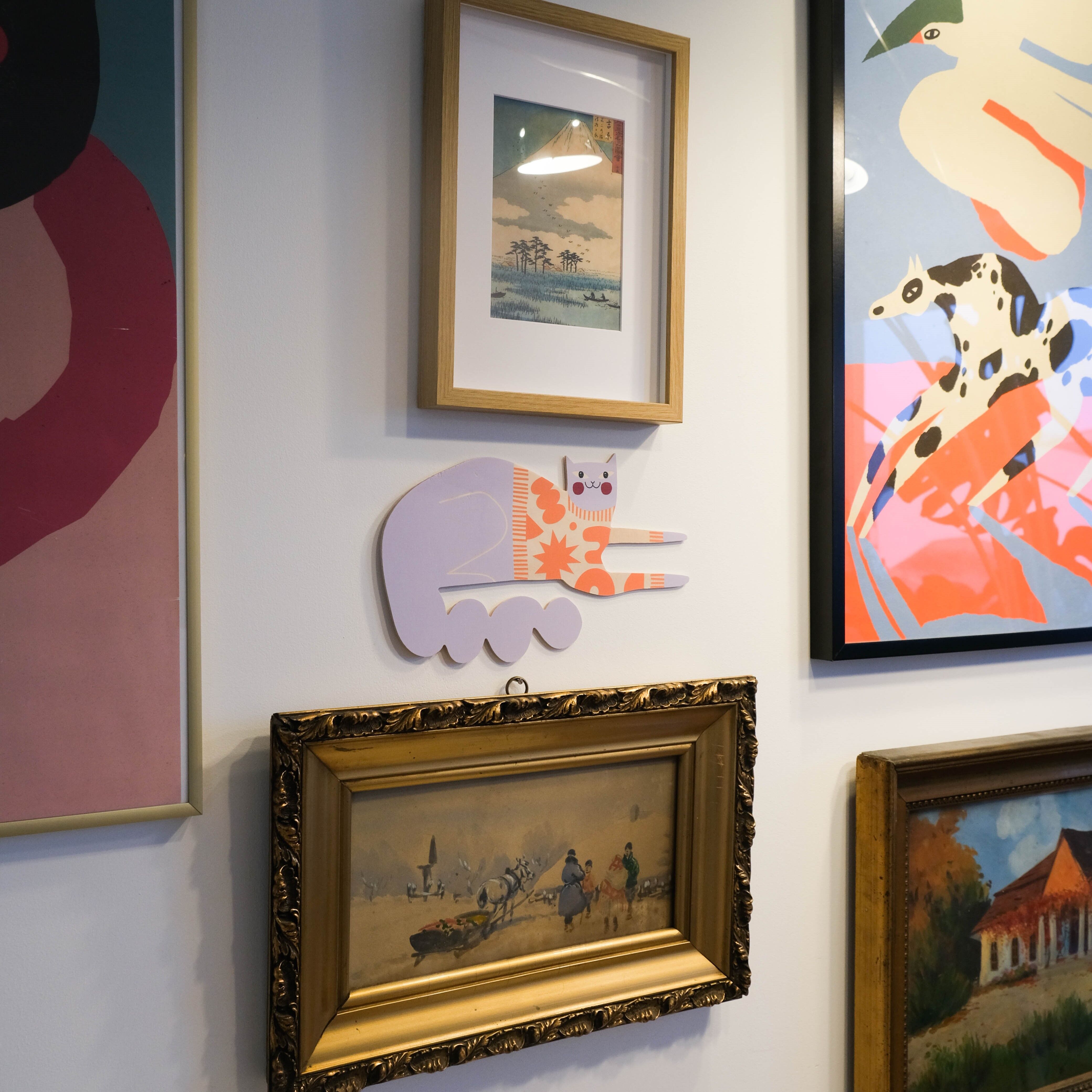Rolls decoration in the shape of cat, wooden wall decor
