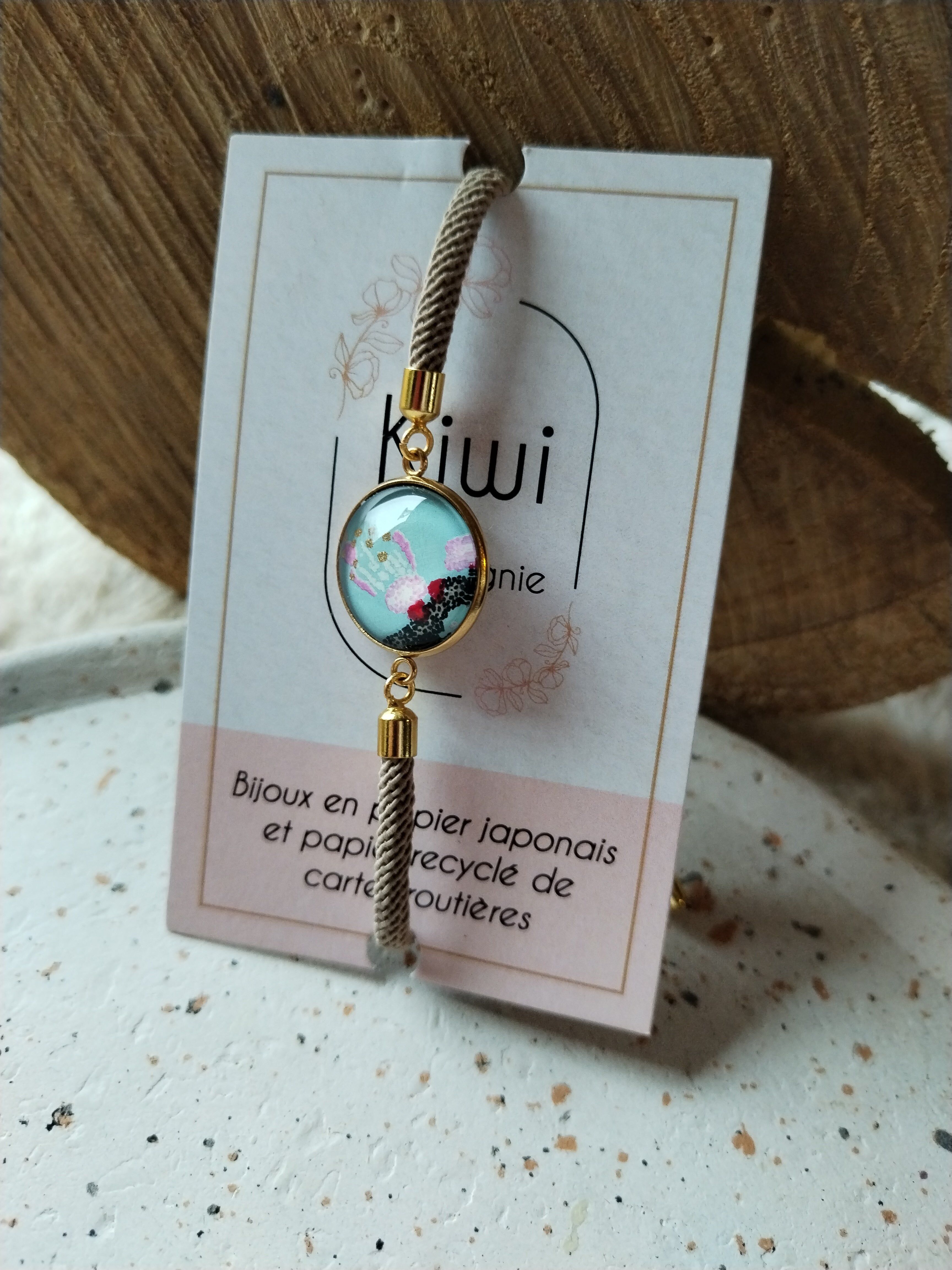 Adjustable beige cotton bracelet - pink cabochon white flower