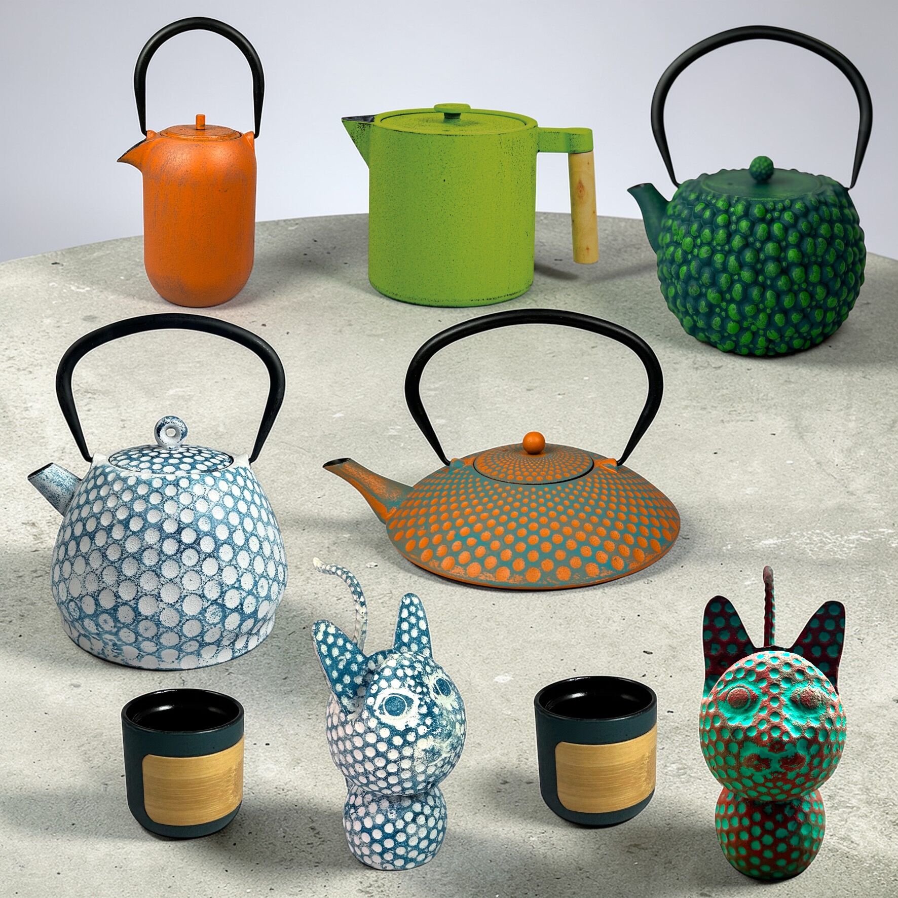 Cast iron gift set petrol-red-green – 5 teapots, 2 mugs, decorative figure