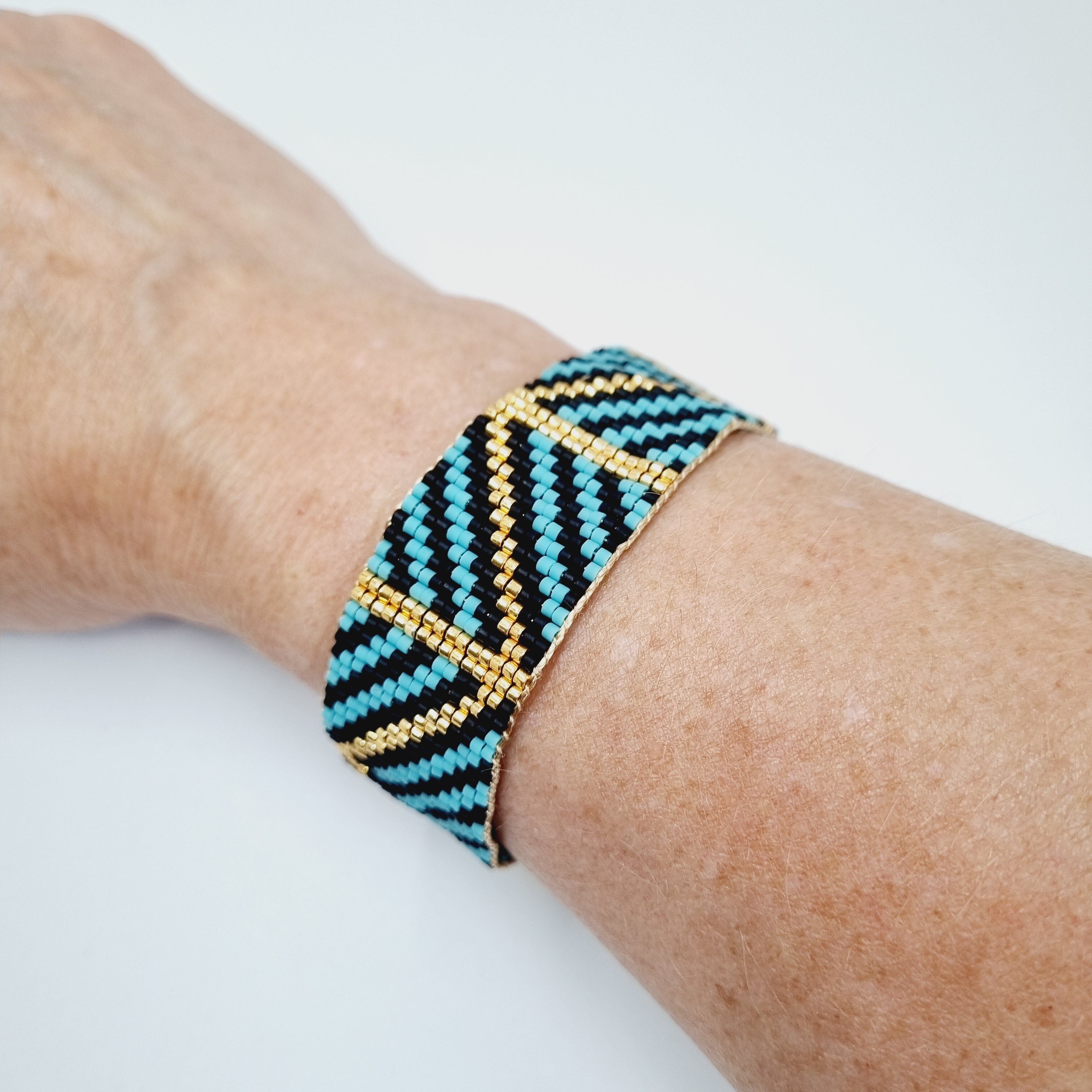 Nova blue and gold woven beaded cuff bracelet