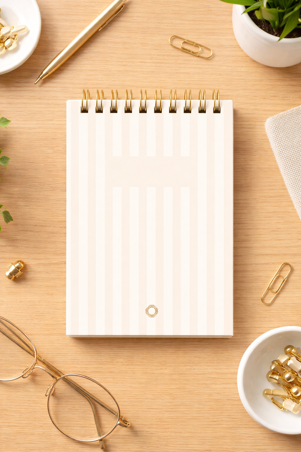 A6 spiral notebook – Laid paper with pink stripes, dark gold spiral binding – 80g ivory paper (150 pages)