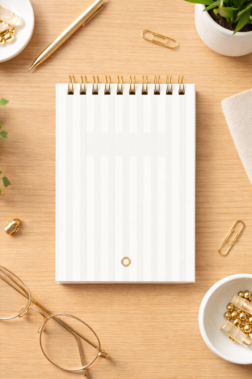 A6 spiral notebook – Laid paper with grey stripes, dark gold spiral binding – 80g ivory paper (150 pages)