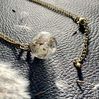 Collier fleur séchée pissenlit, pendentif sphere de verre doré