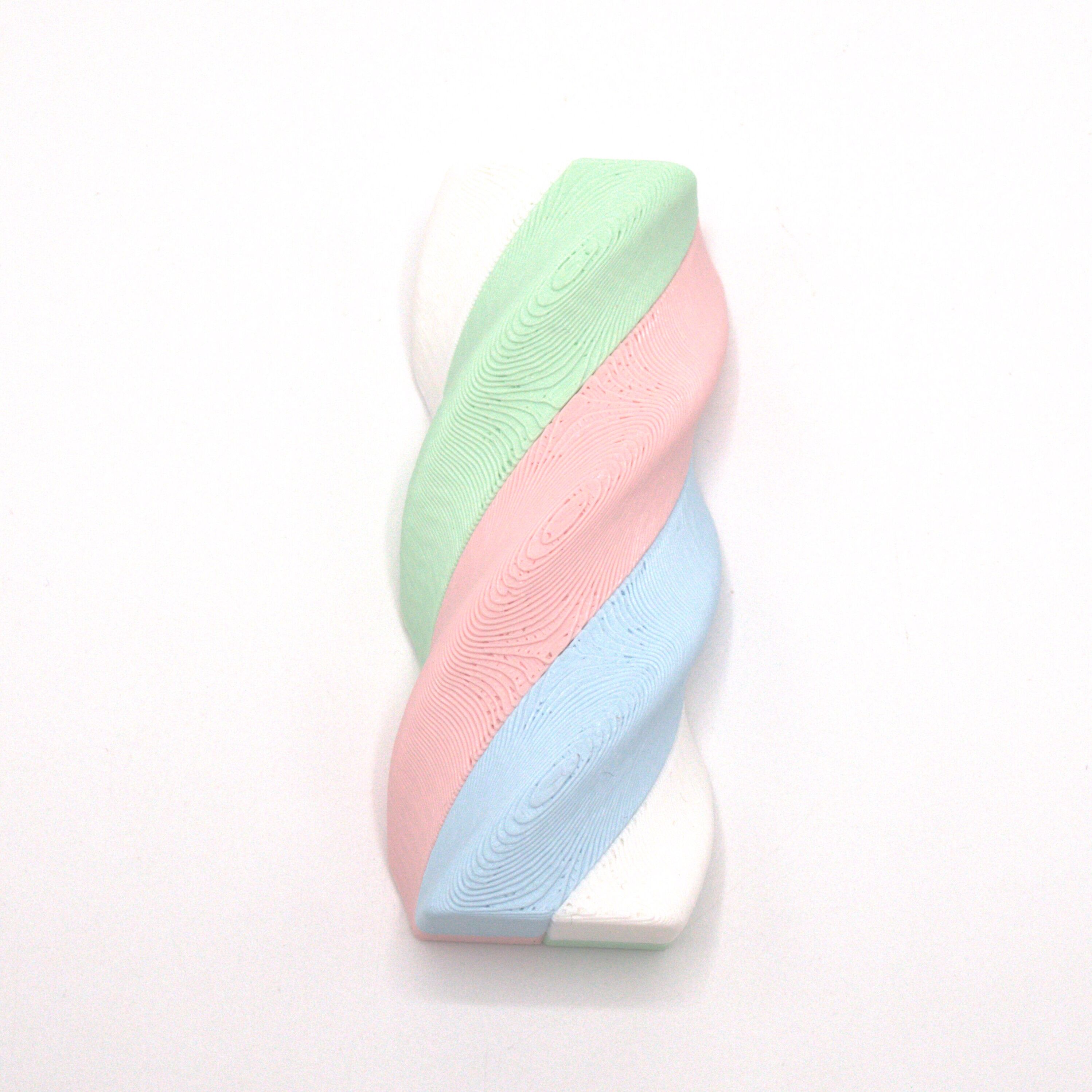 Bonbon magnétique, torsadé en 4 couleurs avec du vert
