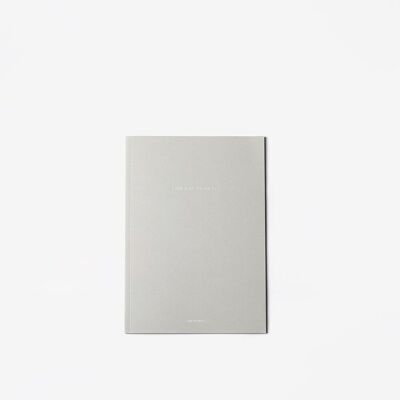 Cuaderno gris con papel cuadriculado