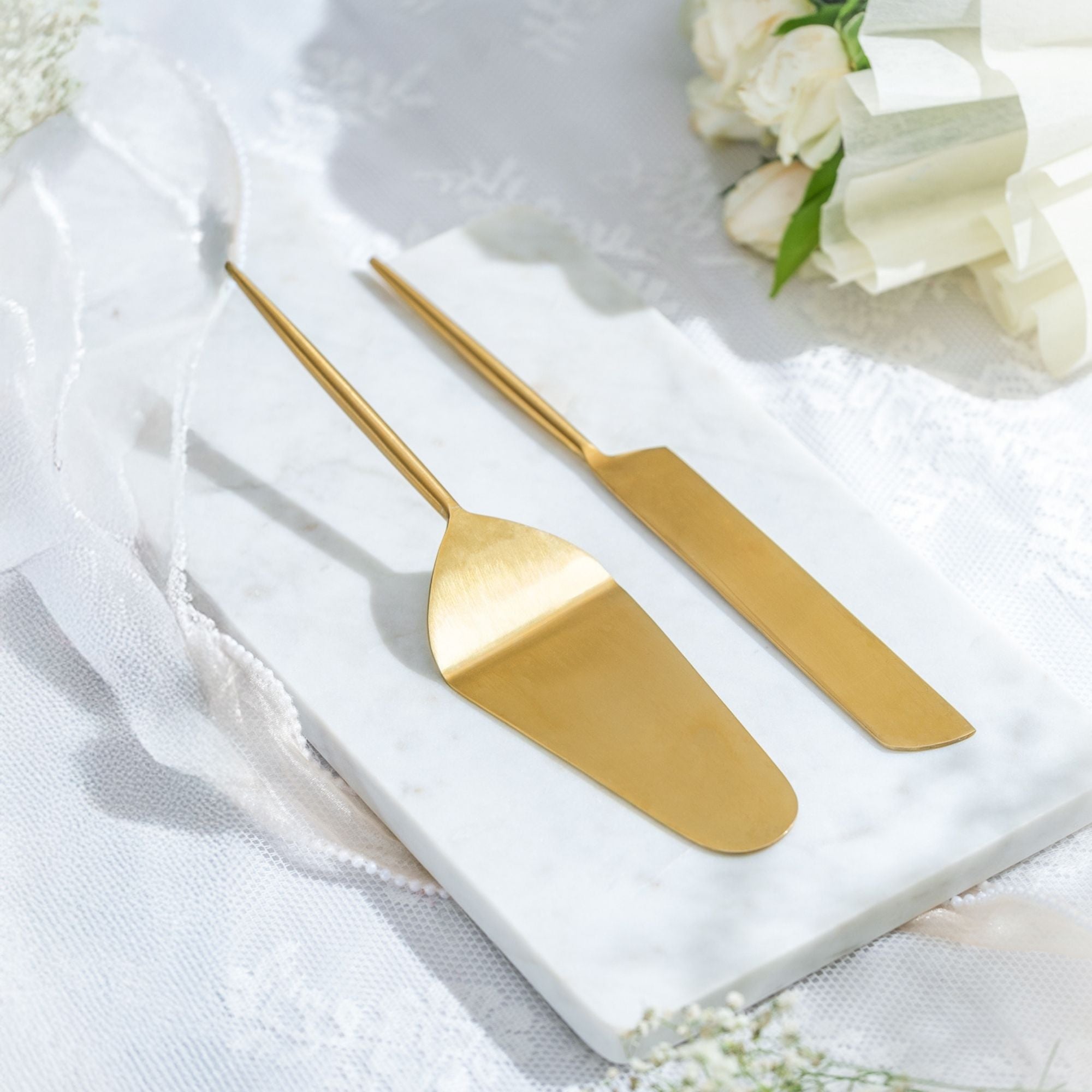 Handgefertigte, goldfarbene Tortenheber (2er-Set)