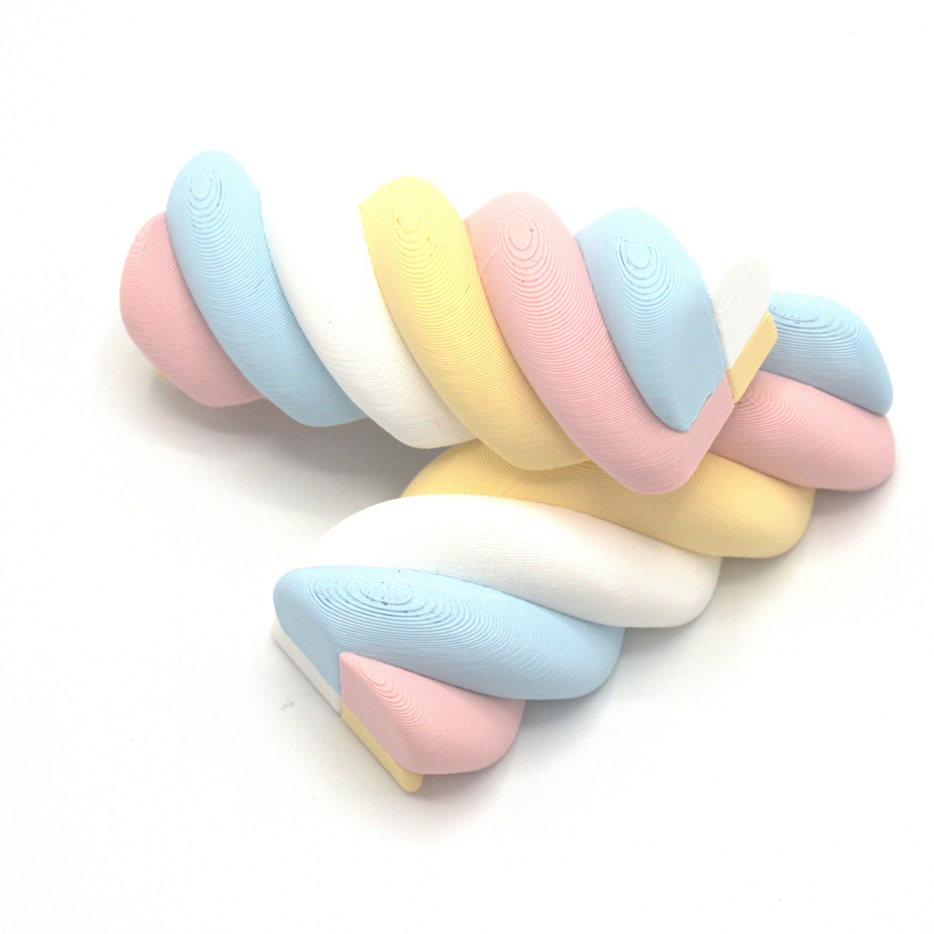 Bonbon magnétique, torsadé en 4 couleurs avec du bleu