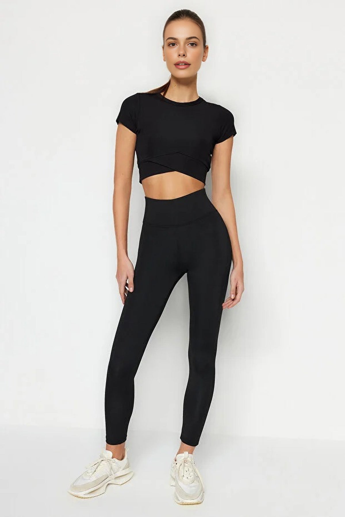 Leggings de sport en maille gainante avec large élastique à la taille.