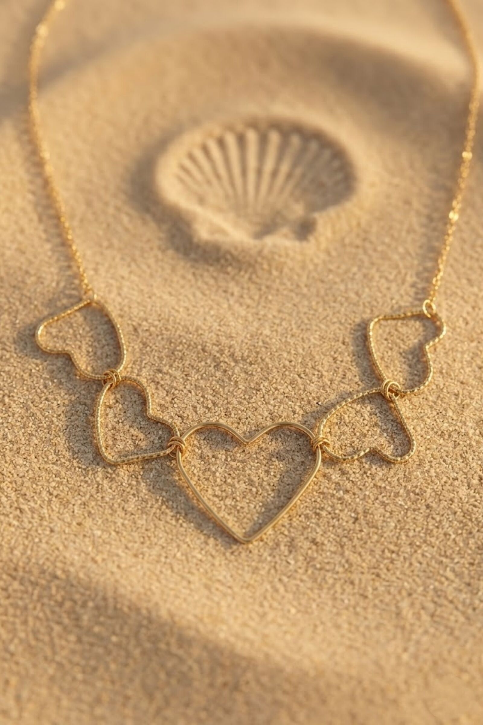 Collier cœurs dorés en acier inoxydable – Élégance & amour