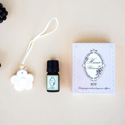 Difusor de habitación de porcelana de flores colgantes con aceite de aroma de bergamota refrescante