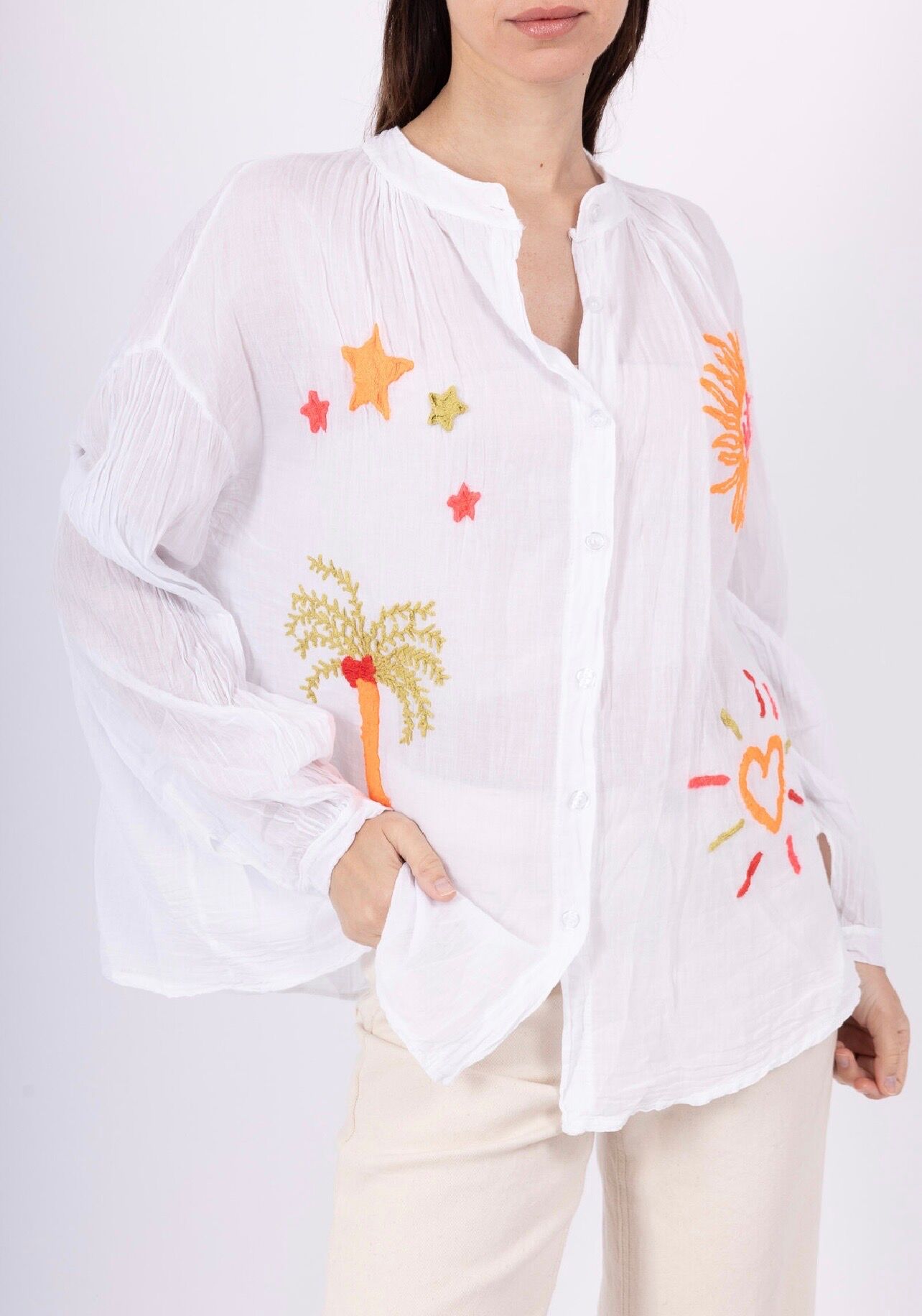 Lightweight, loose-fitting bohemian shirt with mandarin collar and colorful summer embroidery
