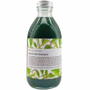 Shampooing liquide à l'ortie et aux herbes, flacon en verre de 250 ml