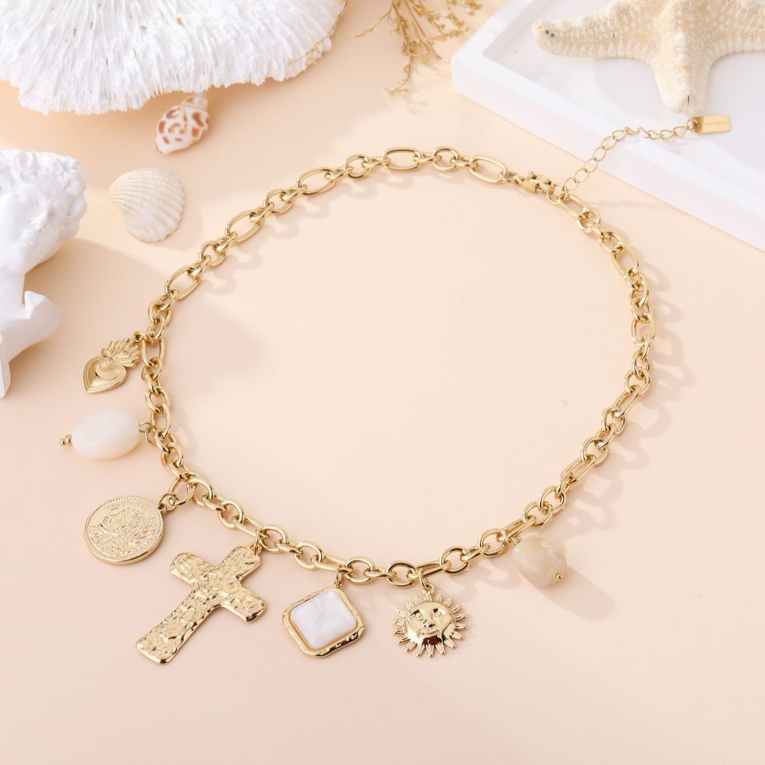 Gold chain necklace with sun and cross charms