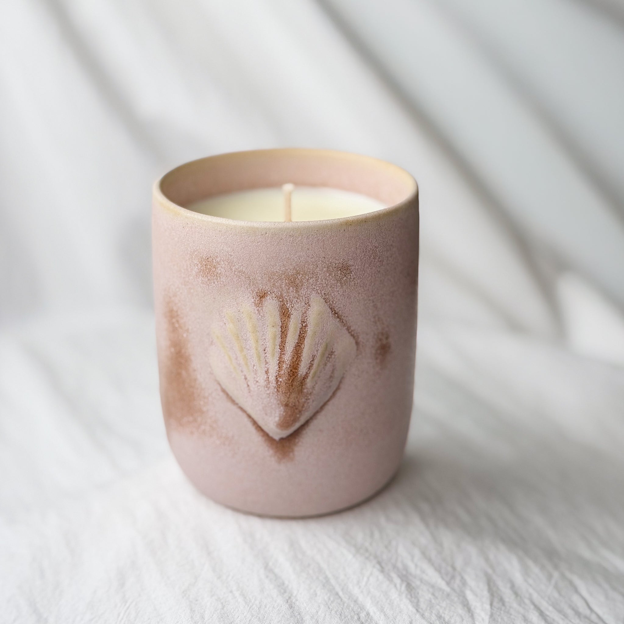 Purple candle with a hint of mimosa